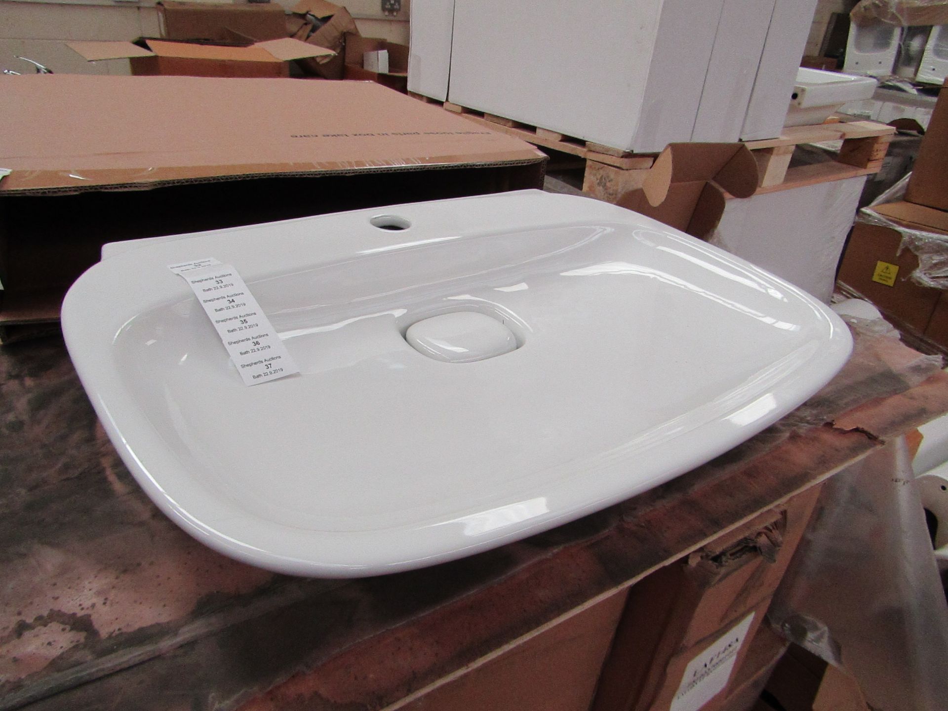 Laufen Made 60cm Sink with Ceramic plug hole cover, new and boxed