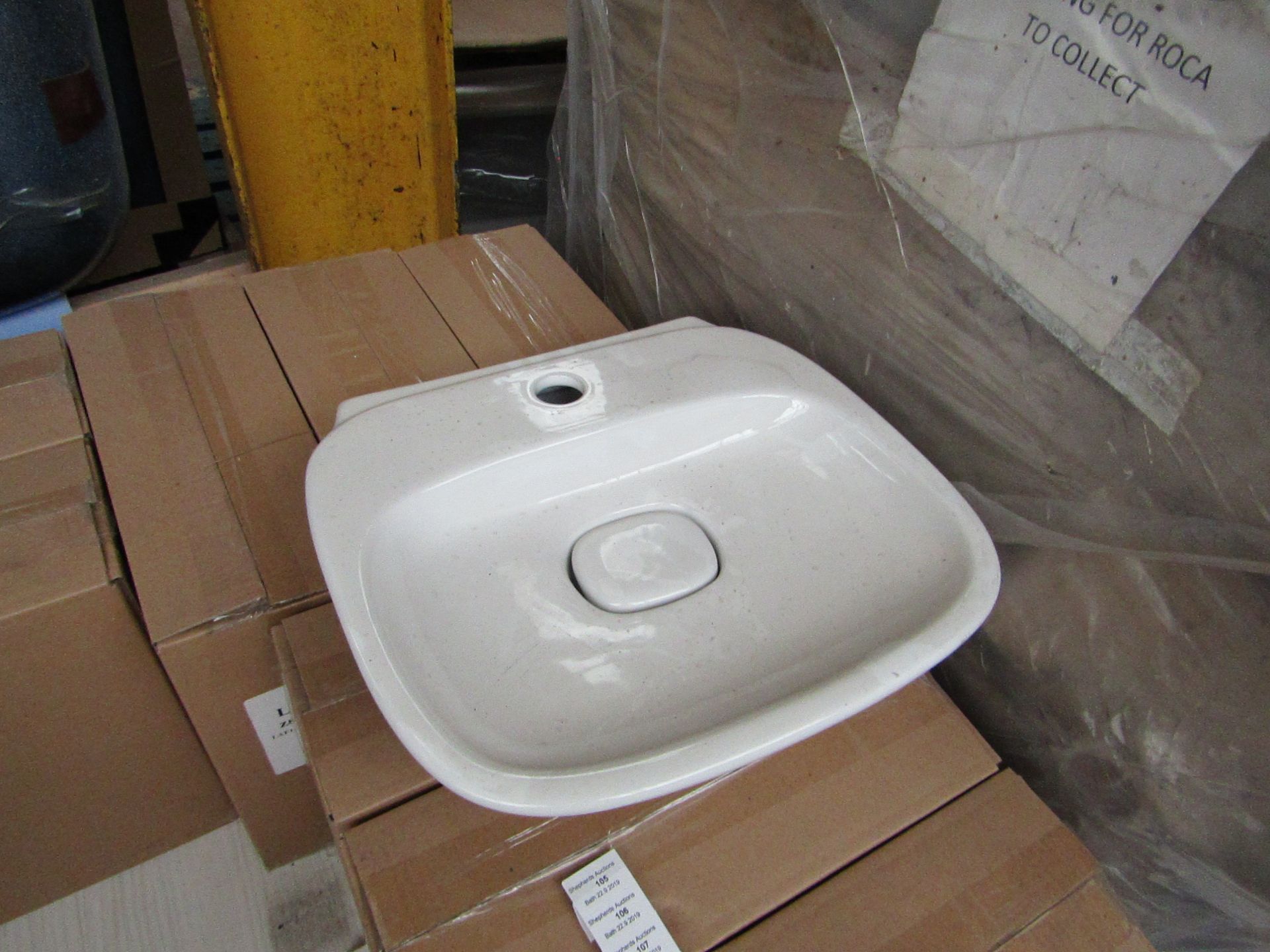 Laufen Made 400mm sink with ceramic plug cover and mono block mixer tap, new and boxed