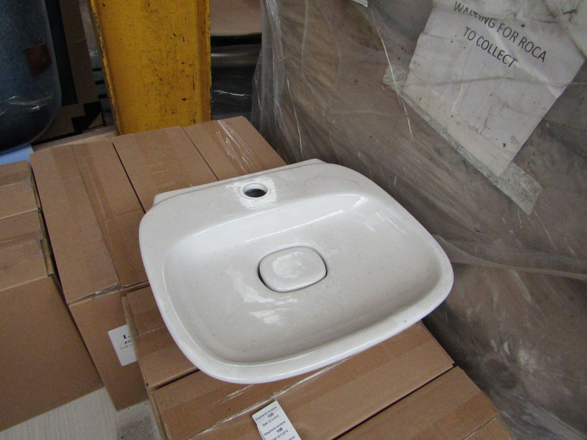 Laufen Made 500mm sink with ceramic plug cover and mono block mixer tap, new and boxed