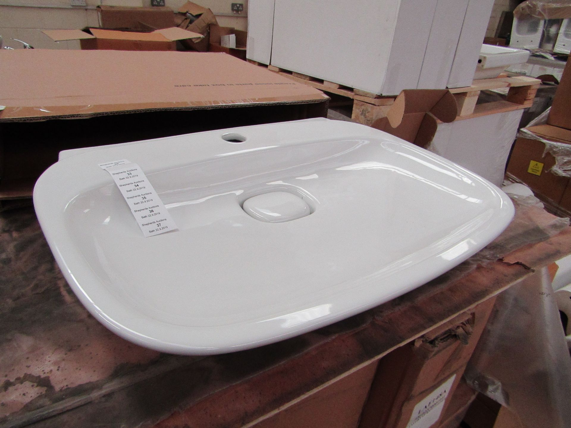 Laufen Made 60cm Sink with Ceramic plug hole cover, new and boxed