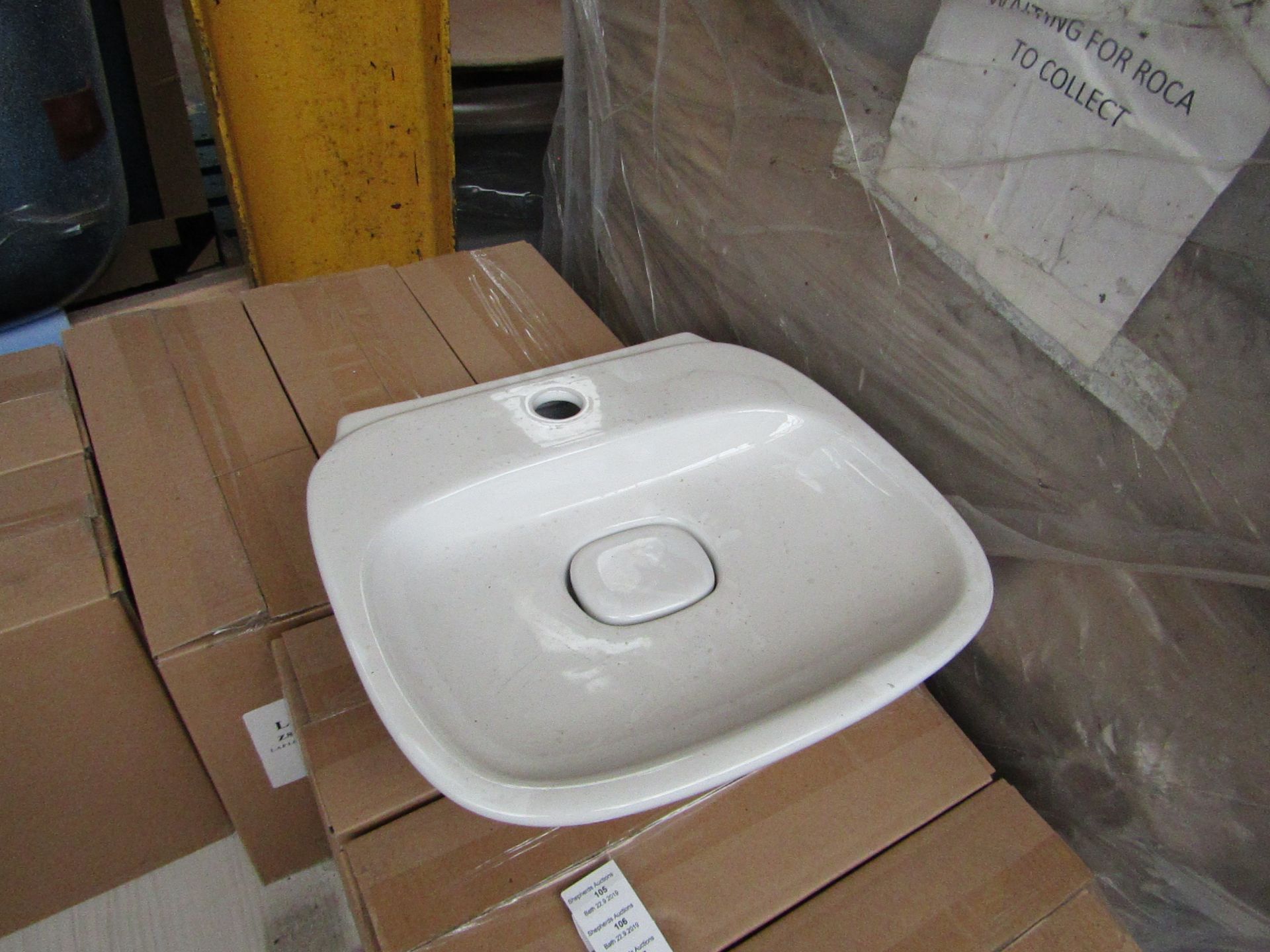 Laufen Made 400mm sink with ceramic plug cover and mono block mixer tap, new and boxed