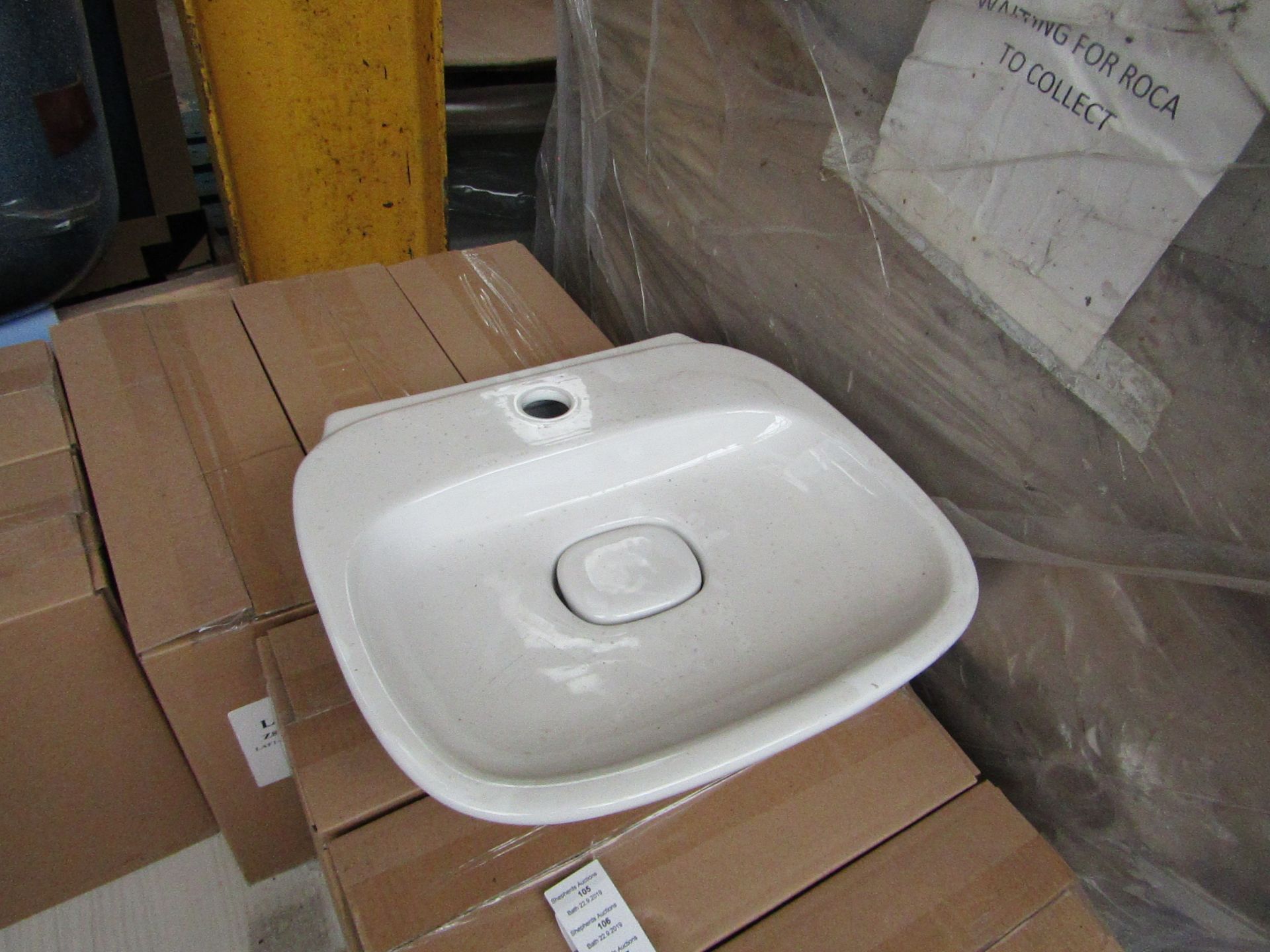 Laufen Made 500mm sink with ceramic plug cover and mono block mixer tap, new and boxed