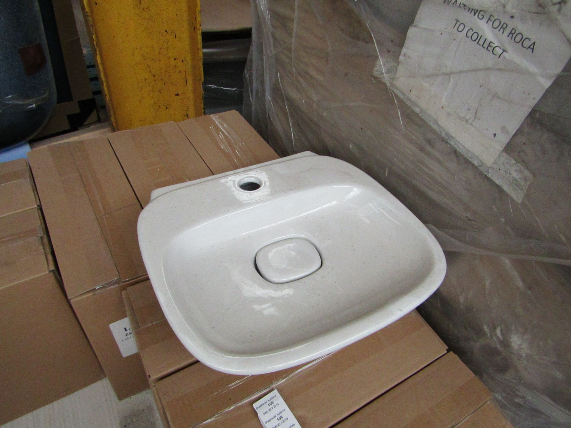 Laufen Made 400mm sink with ceramic plug cover and mono block mixer tap, new and boxed