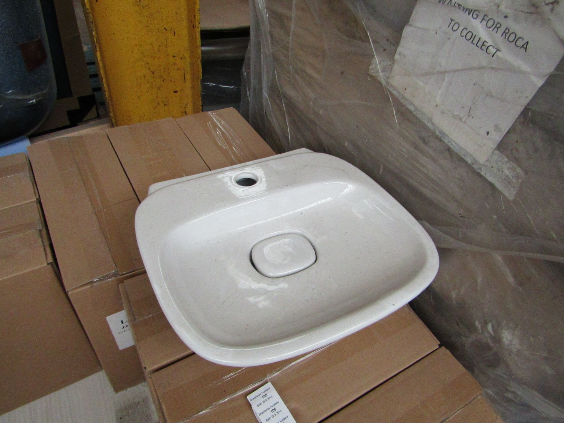 Laufen Made 500mm sink with ceramic plug cover and mono block mixer tap, new and boxed