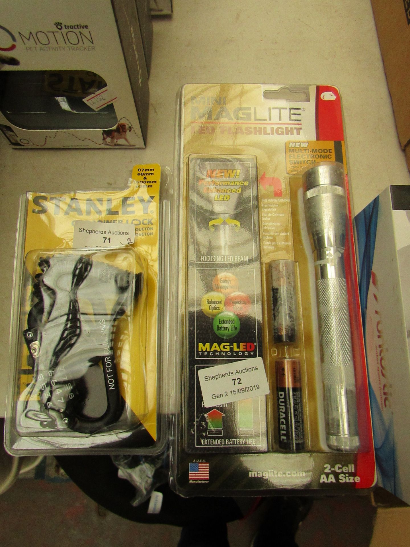 2 x Items being 1 x Mini Maglite LED Flashlight and 1 x Stanley Carabinery Lock, Both Unchecked