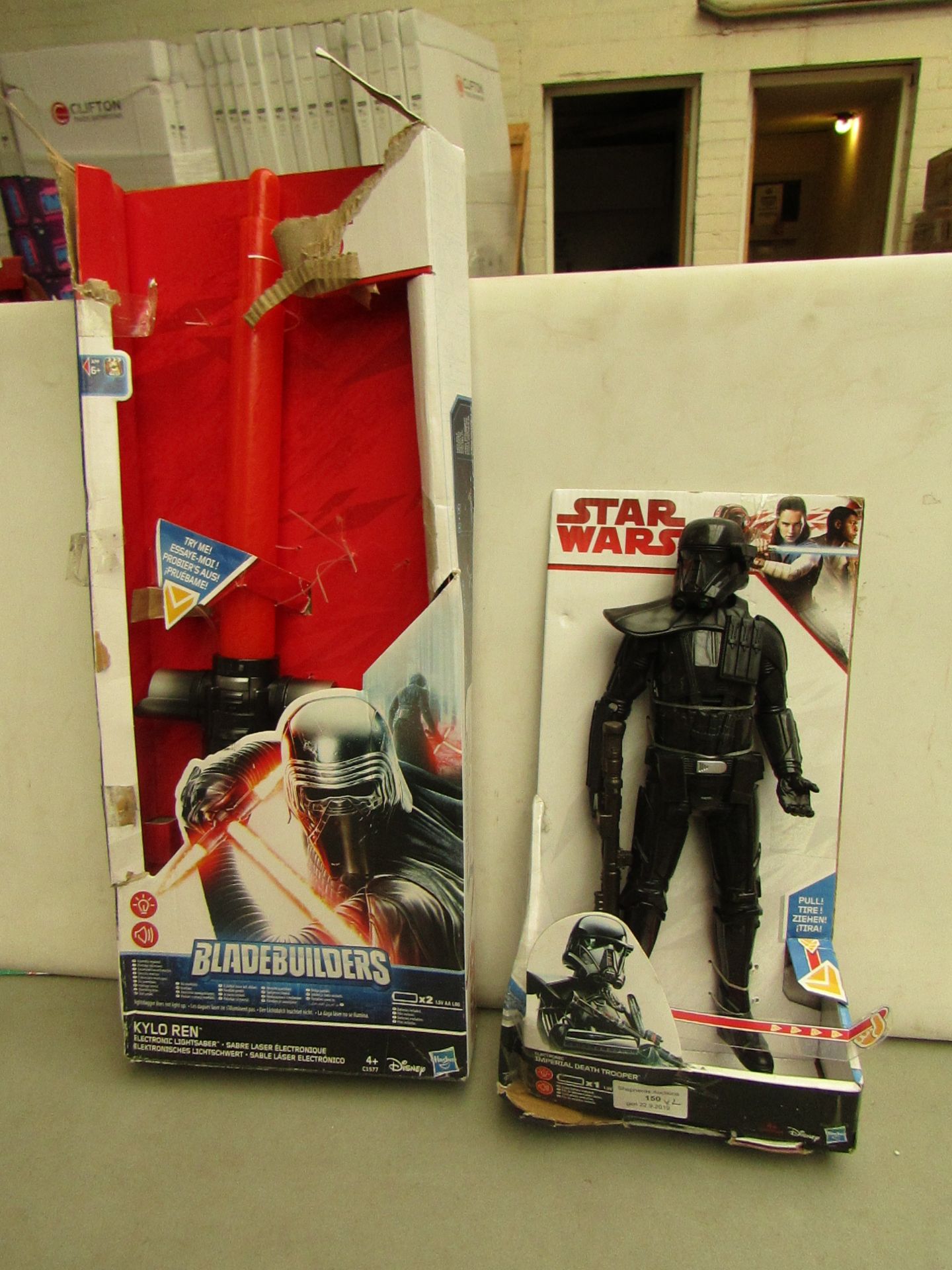 2 x items being 1 x Imperia Death trooper, looks complete but damaged packaging and 1 x Blade