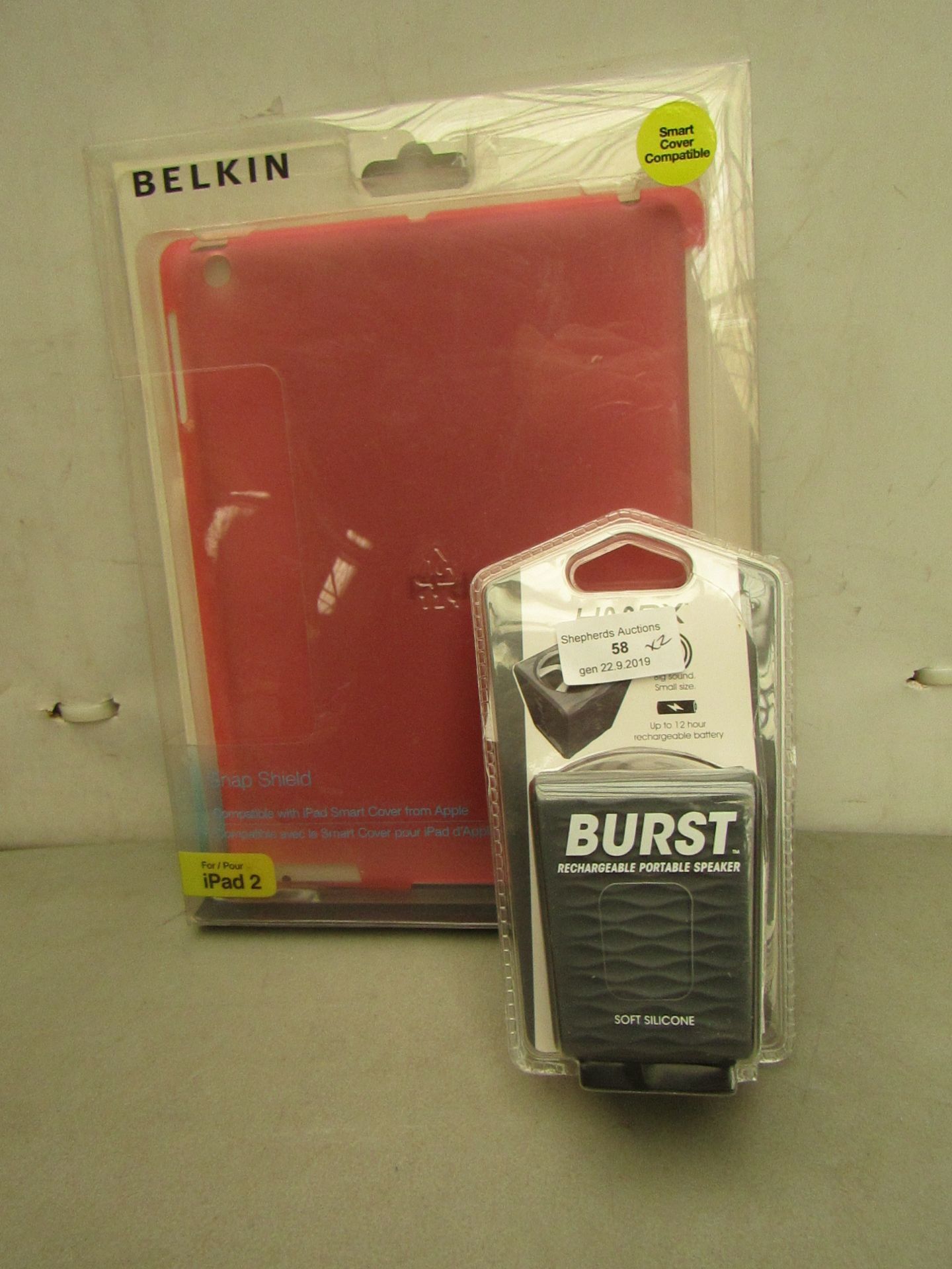 2 items being 1 x Belkin Ipad2 cover and 1 x Burst Rechargeable Portable speaker unchecked