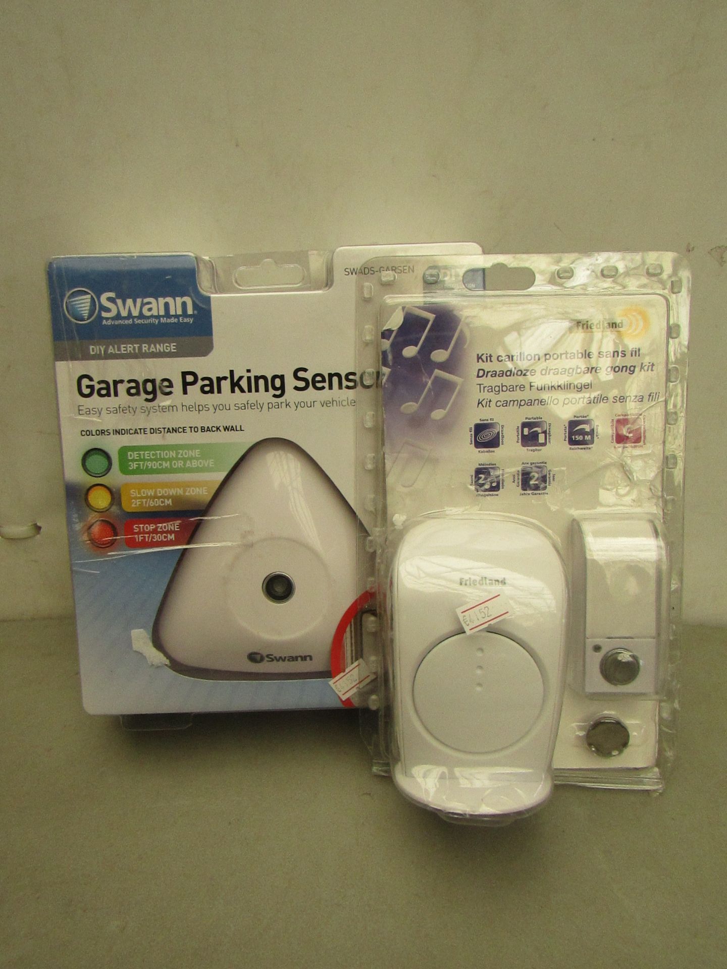 2 x Items being 1 x Friedland Doorbell and 1 x Swann Garage Parking Sensor, both unchecked