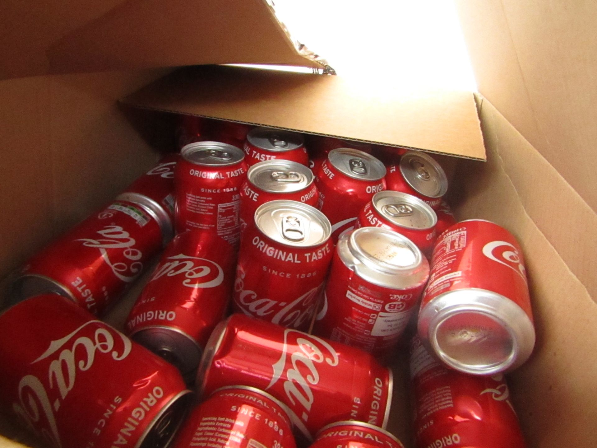 Approx 25 Coca cola 330ml Cans.BB 31/07/20