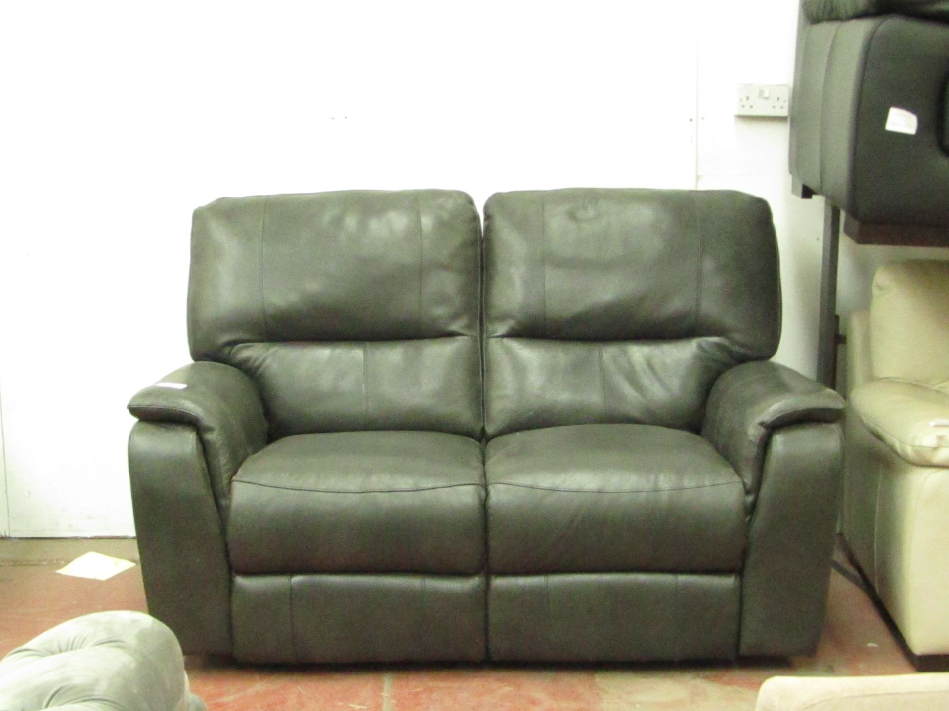 Costco 2 seater manual reclining sofa, the reclining part is working and the sofa has no major