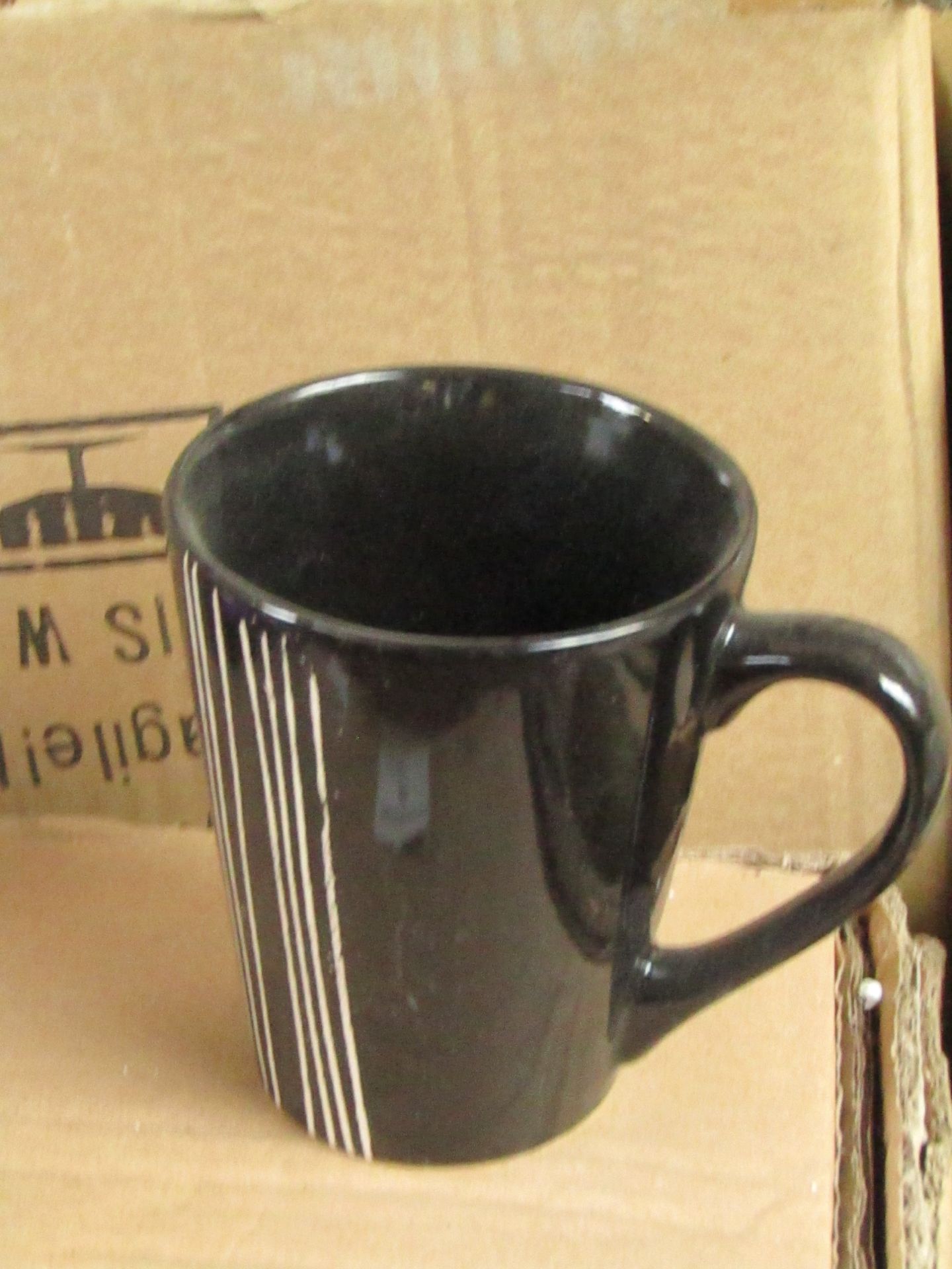 4x Black coloured mugs, new and boxed.