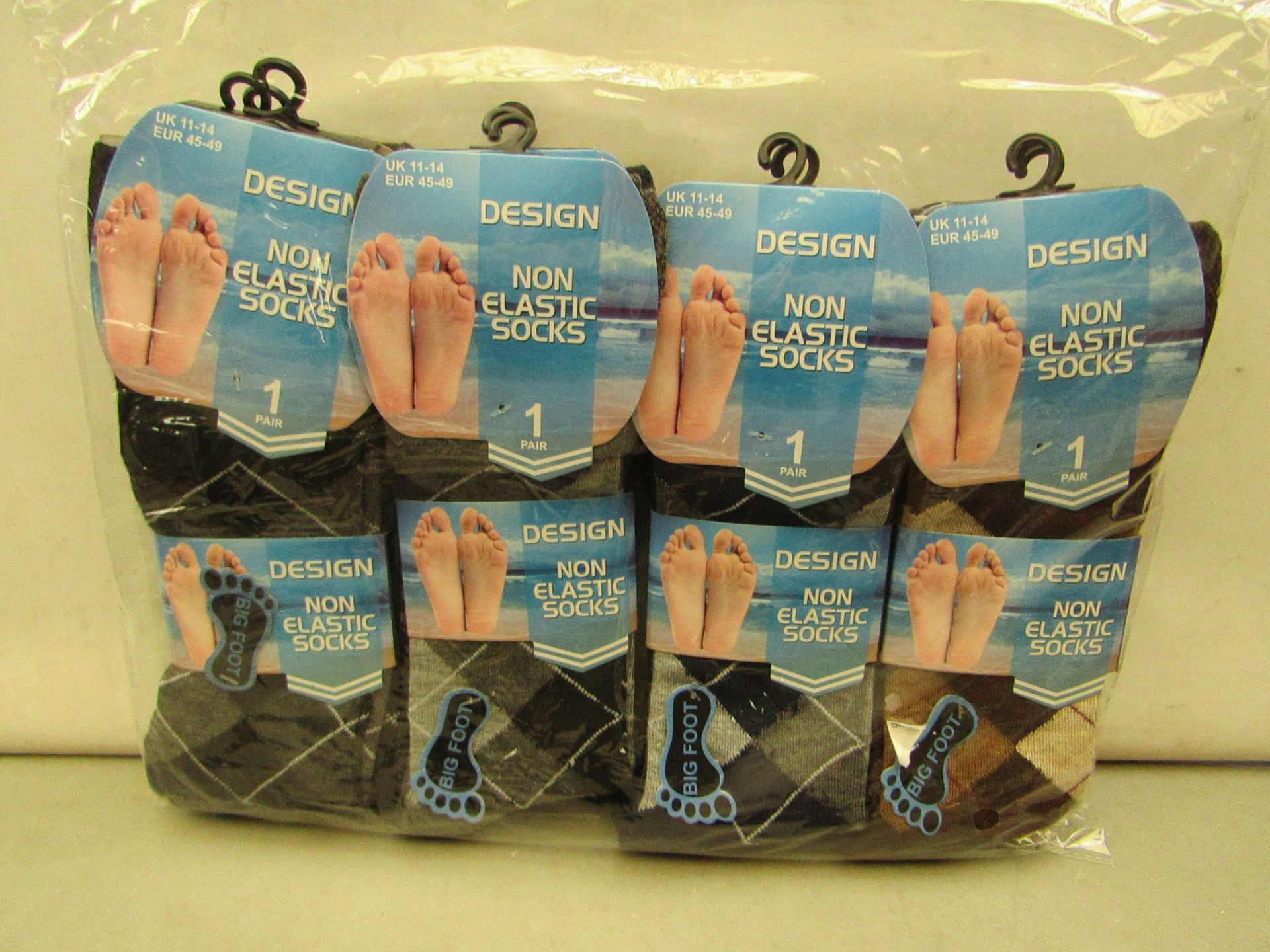 12 x pairs of Design Non Elastic Mens Big Foot Patterned Socks size 11-14 new & packaged