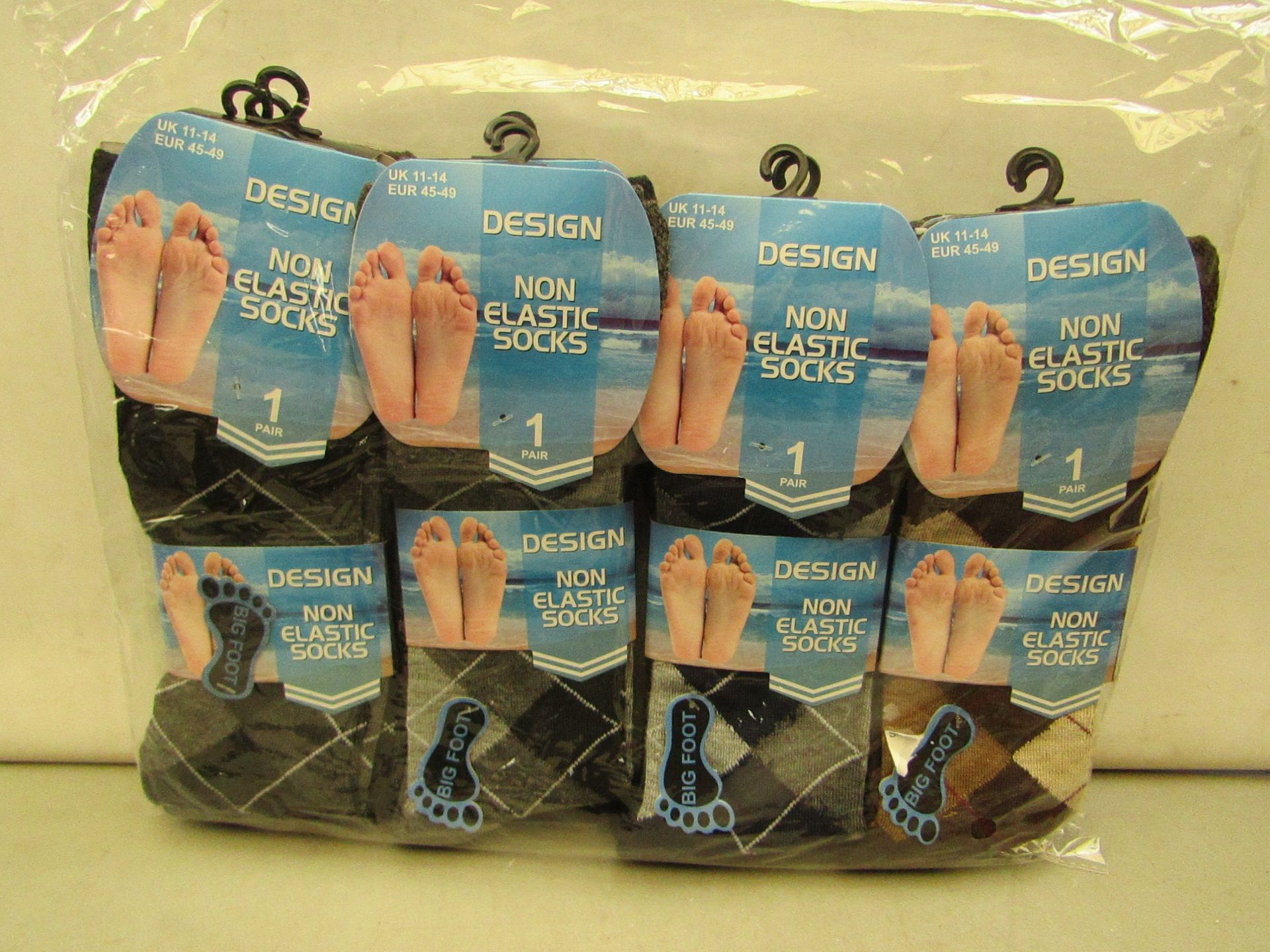 12 x pairs of Design Non Elastic Mens Big Foot Patterned Socks size 11-14 new & packaged