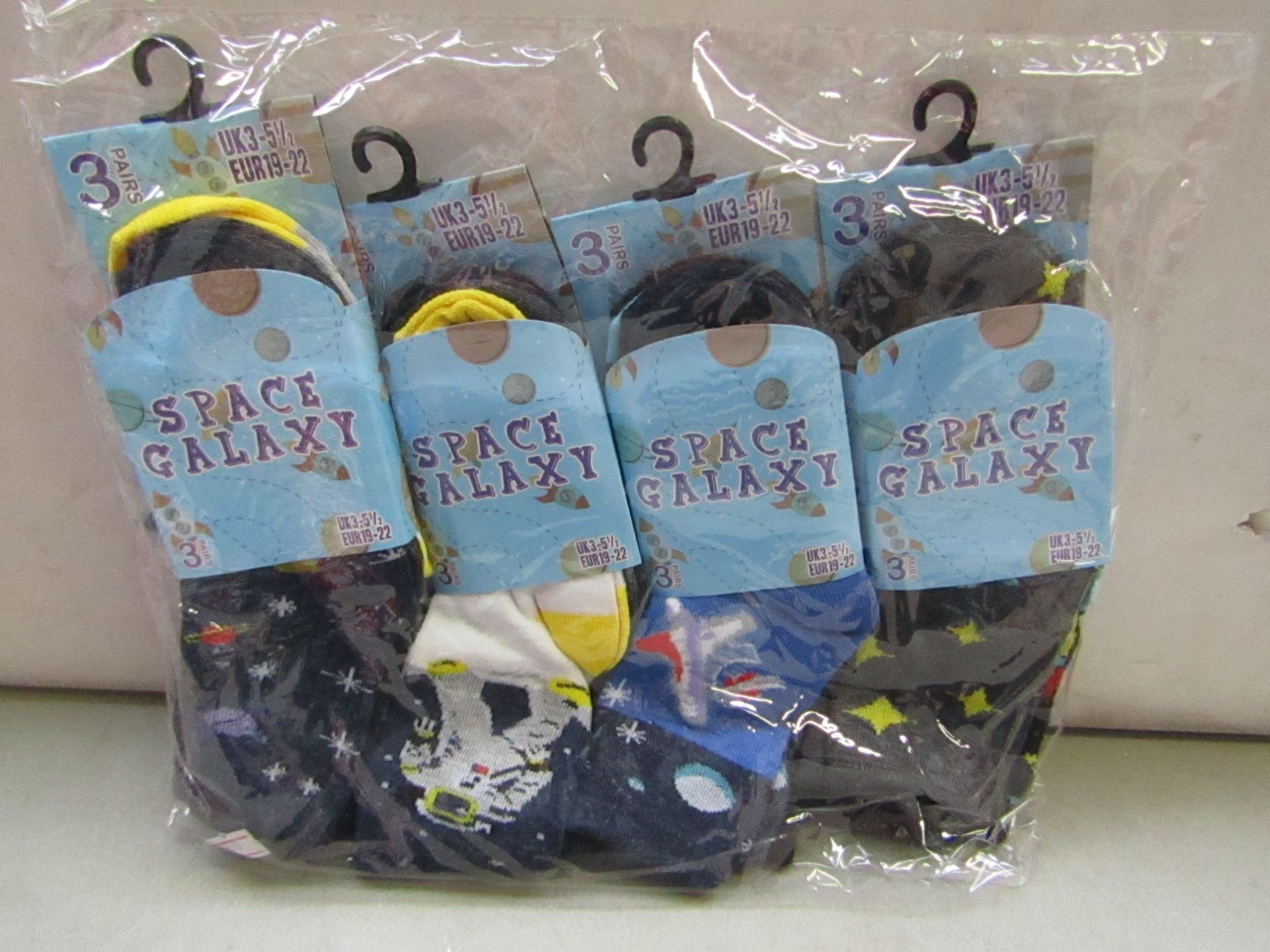 Pack of 12 Childrens Space Galaxy Themed Socks size 3 to 51/2 all new in packaging