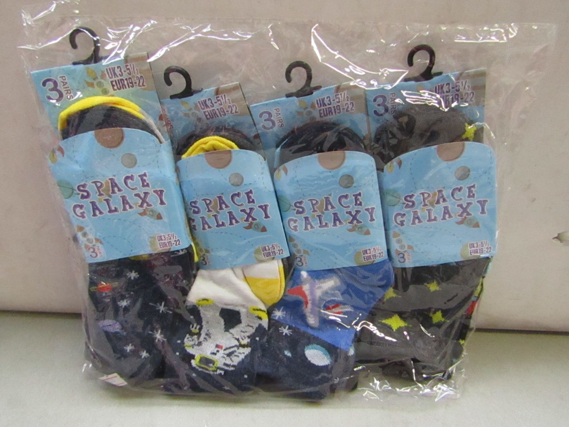 Pack of 12 Childrens Space Galaxy Themed Socks size 3 to 51/2 all new in packaging