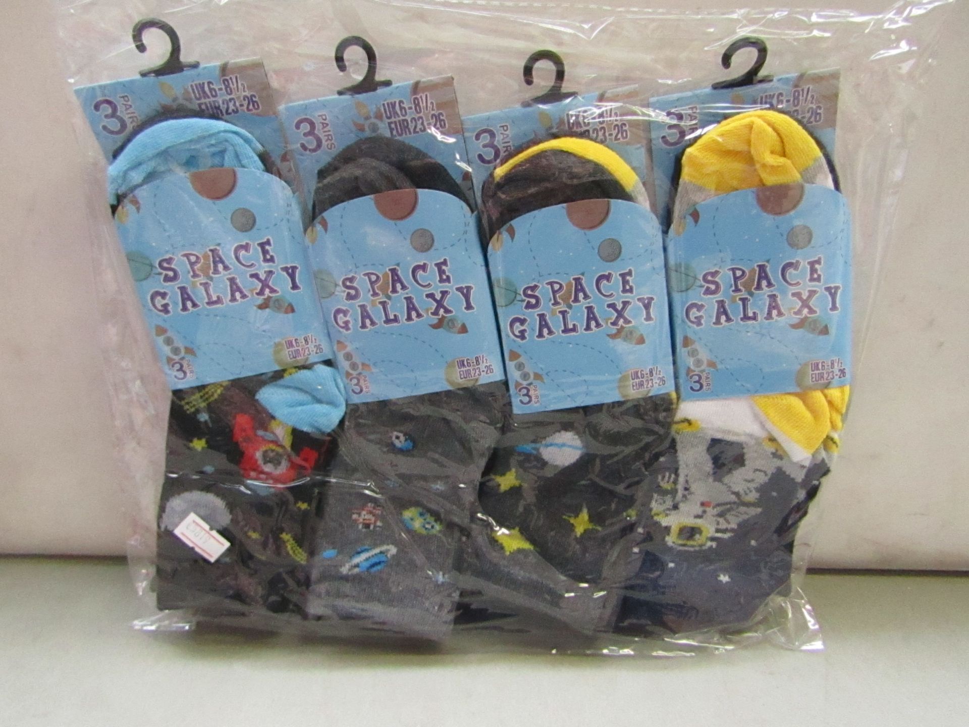 Pack of 12 Childrens Space Galaxy Themed Socks size 6 to 81/2 all new in packaging