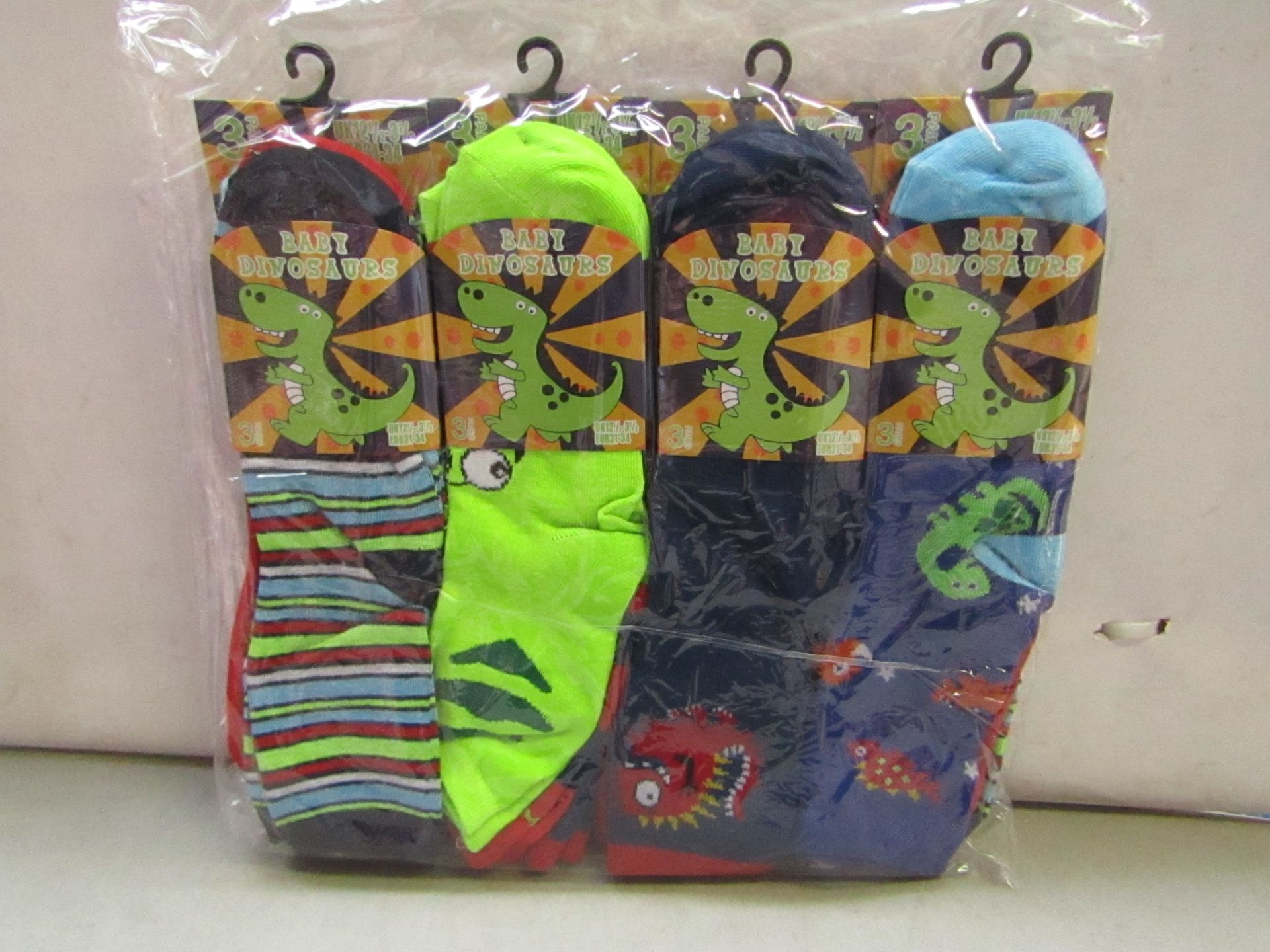 Pack of 12 Childrens Baby Dinosaur Themed socks size 12 1/2 to 3 1/2 all new in packaging