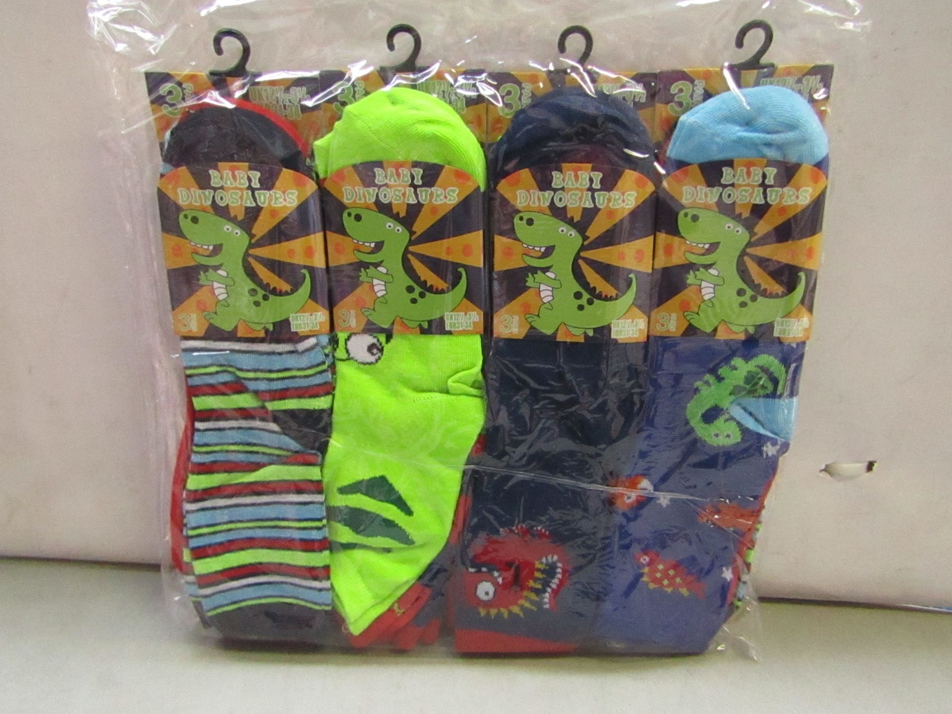 Pack of 12 Childrens Baby Dinosaur Themed socks size 12 1/2 to 3 1/2 all new in packaging