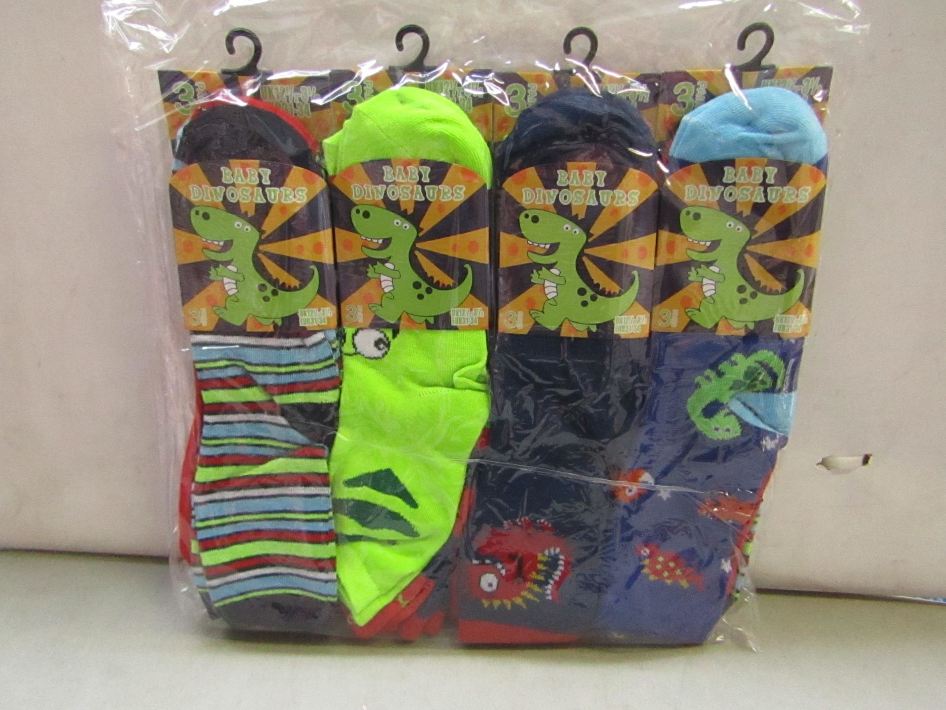 Pack of 12 Childrens Baby Dinosaur Themed socks size 12 1/2 to 3 1/2 all new in packaging