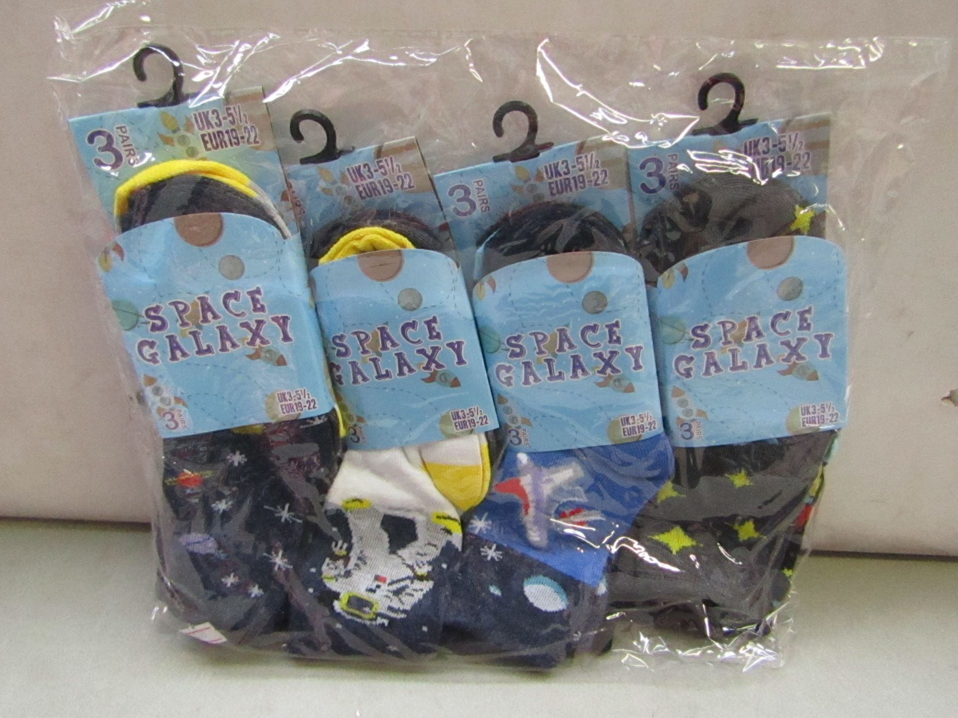 Pack of 12 Childrens Space Galaxy Themed Socks size 3 to 51/2 all new in packaging