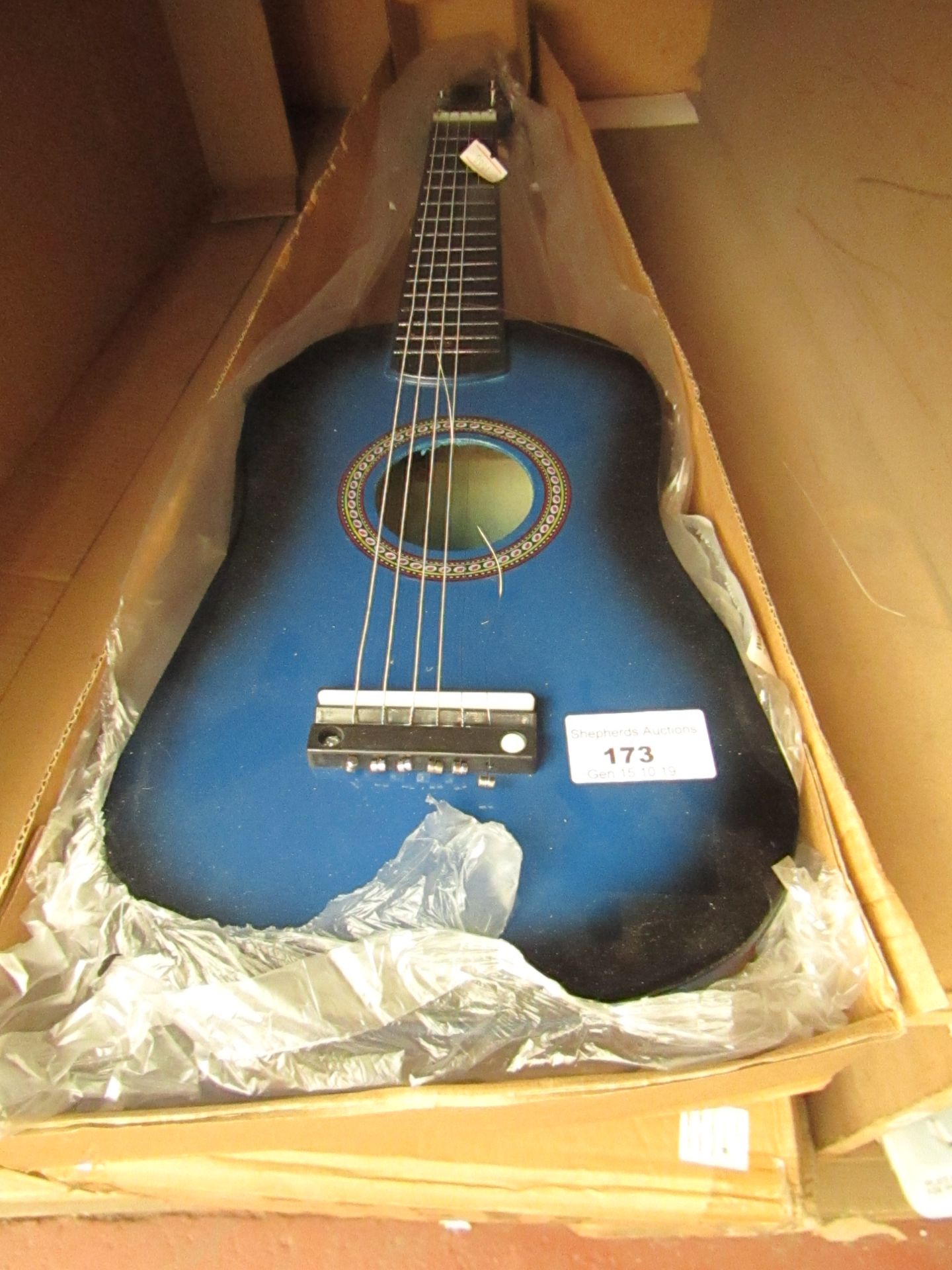 String guitar, boxed.