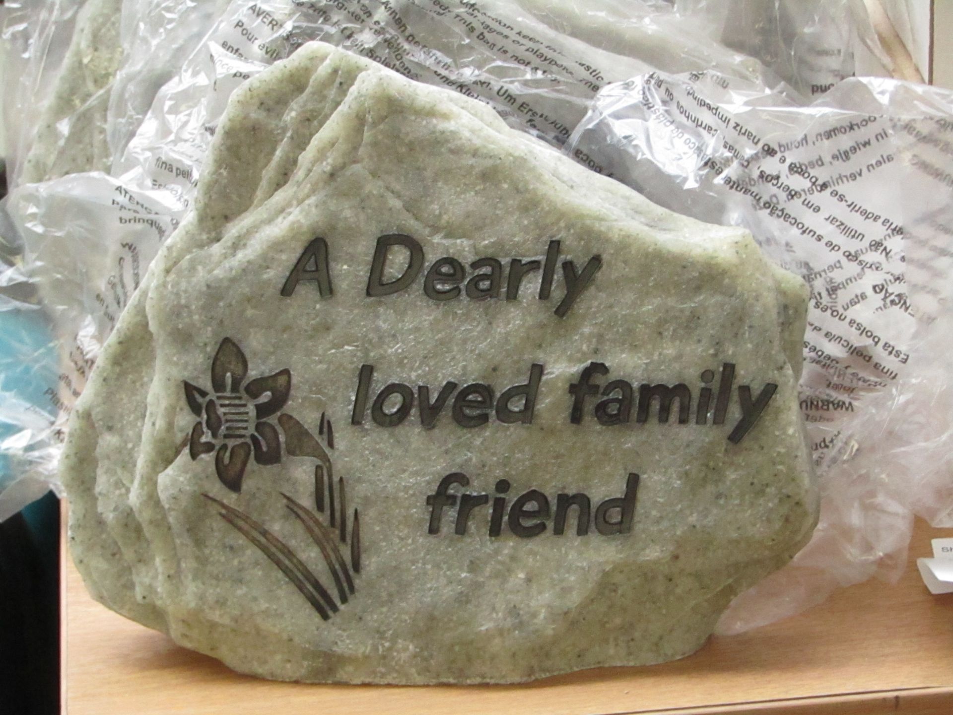 A dearly loved family friend memorial, unchecked and boxed.