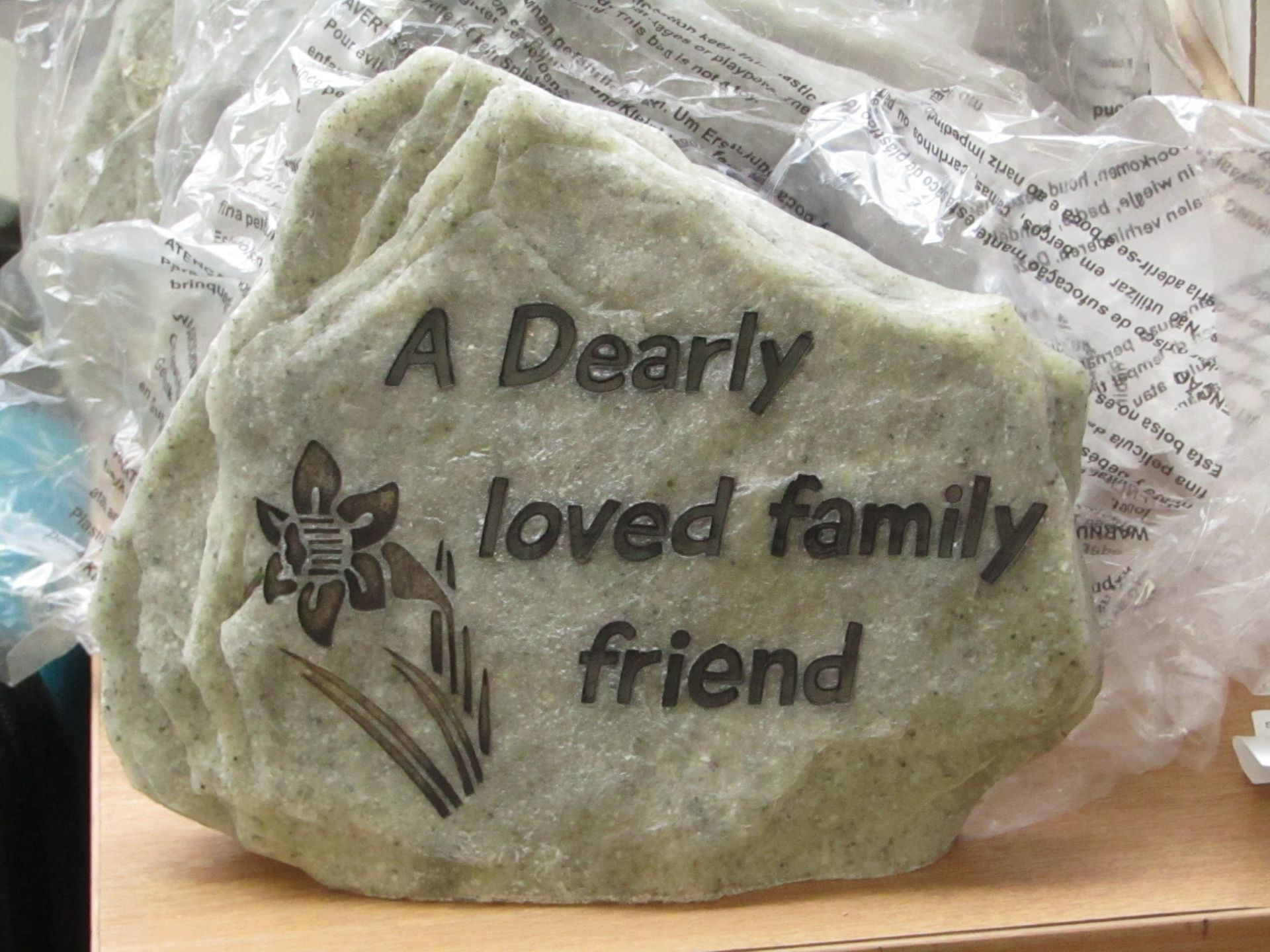 A dearly loved family friend memorial, unchecked and boxed.