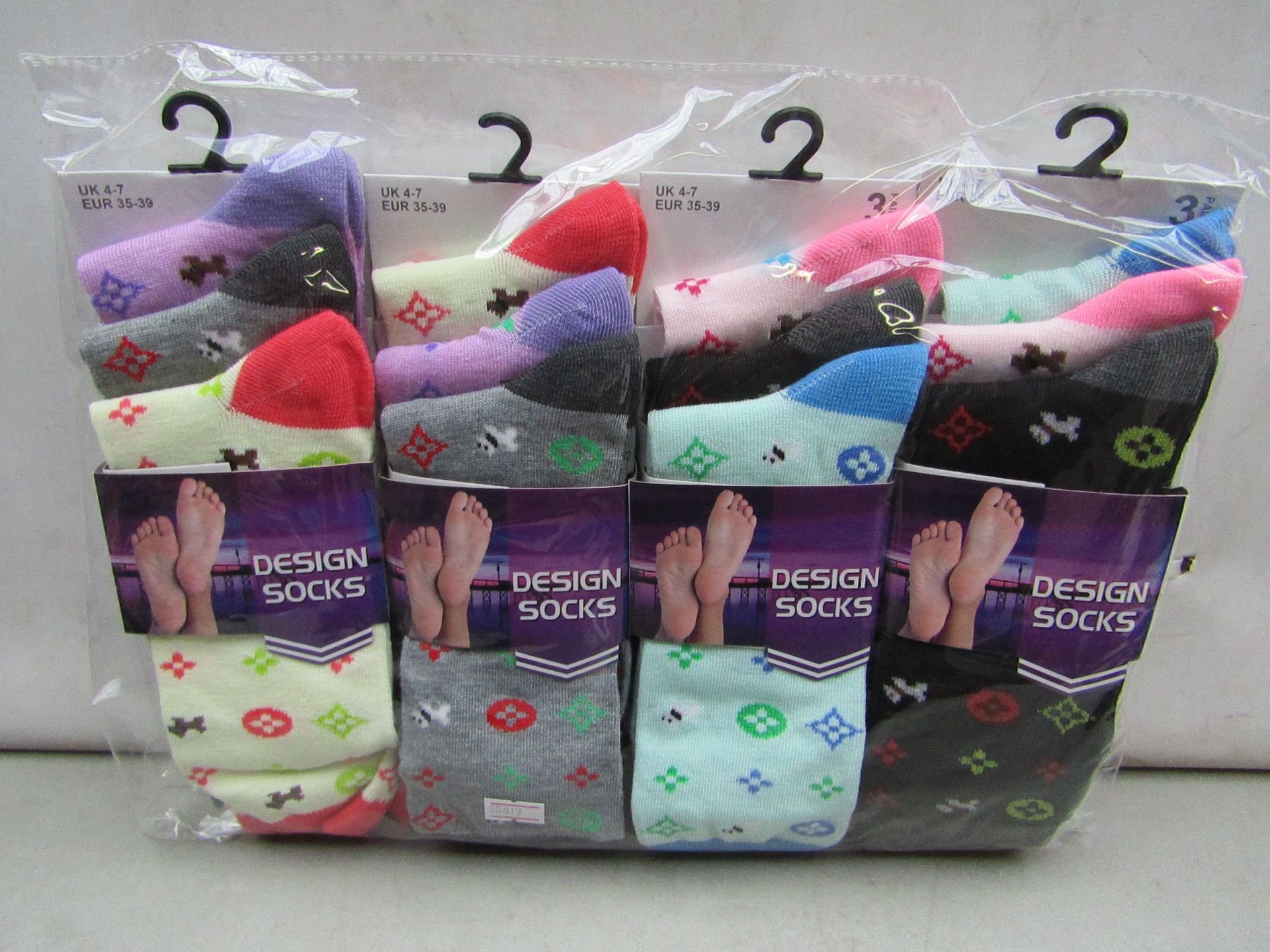 Pack of 12 pairs Ladies Design Socks  Size 4-7 new in packaging