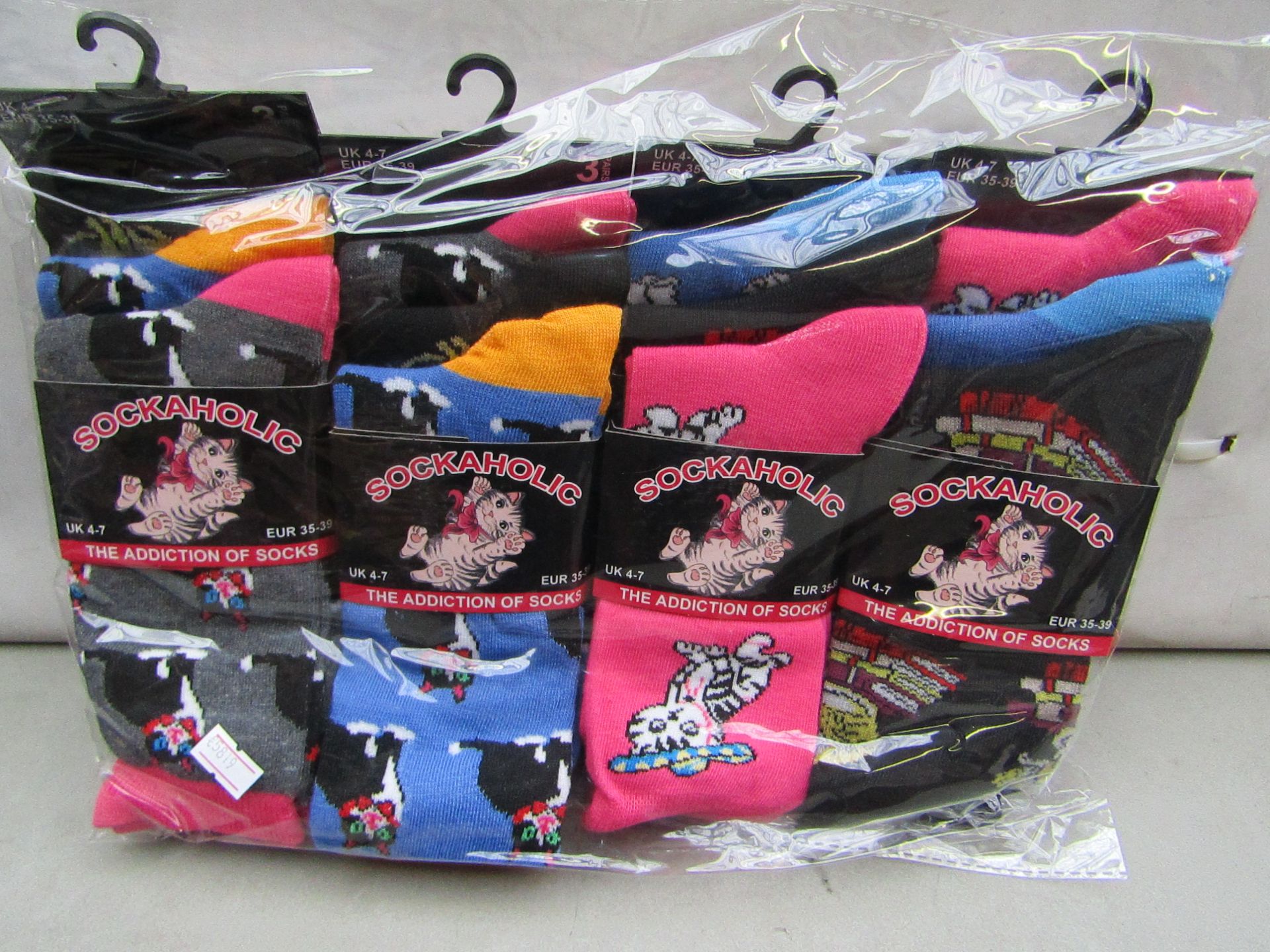 Pack of 12 Ladies Sockaholic Socks size 4-7 all new in packaging