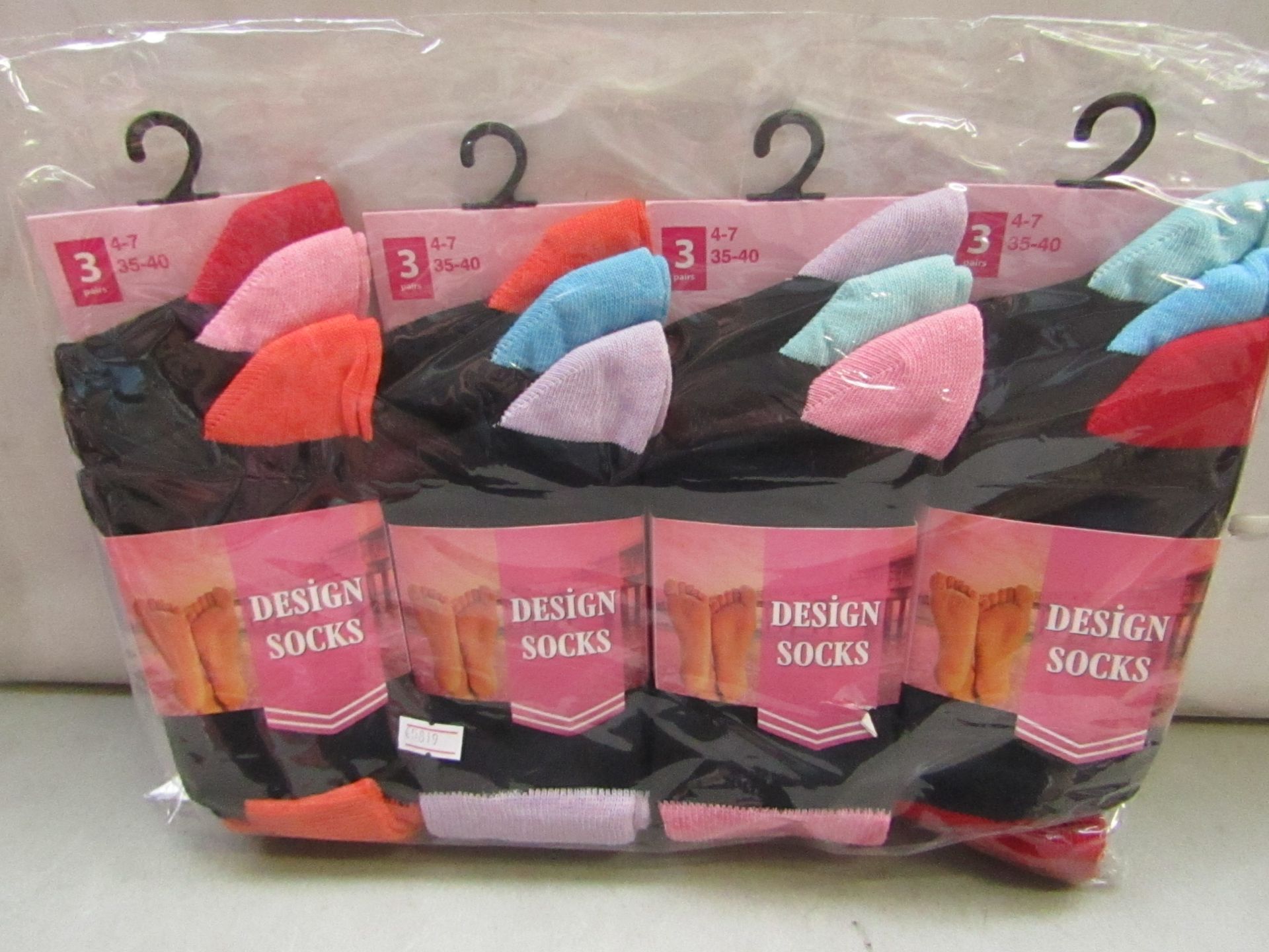 Pack of 12 pairs Ladies Design Socks  Size 4-7 new in packaging