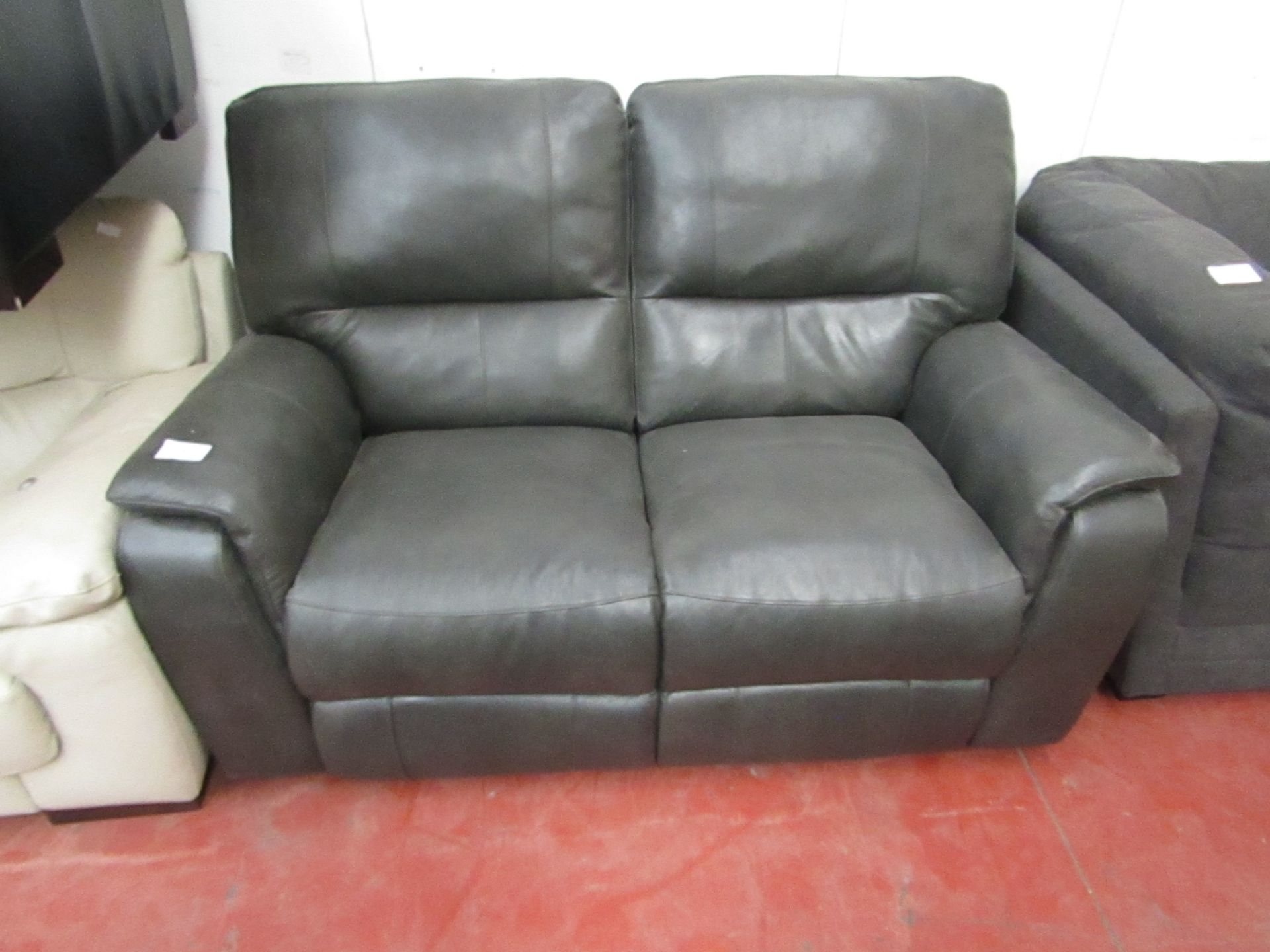 2 seater manual reclining sofa, tested working with no major damage.