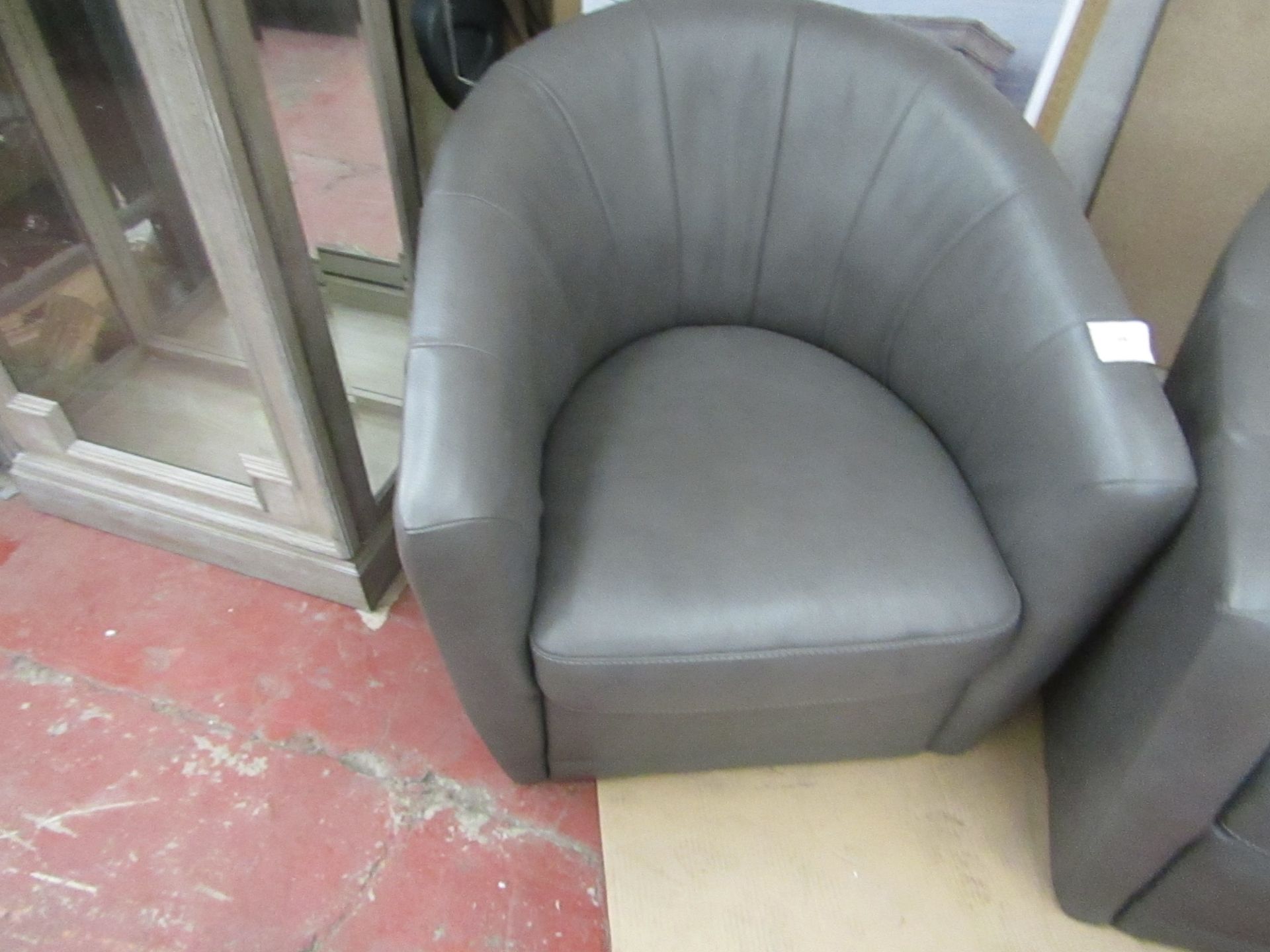 Natuzzi armchair, faulty rotating part under neigh but that could be remmoved