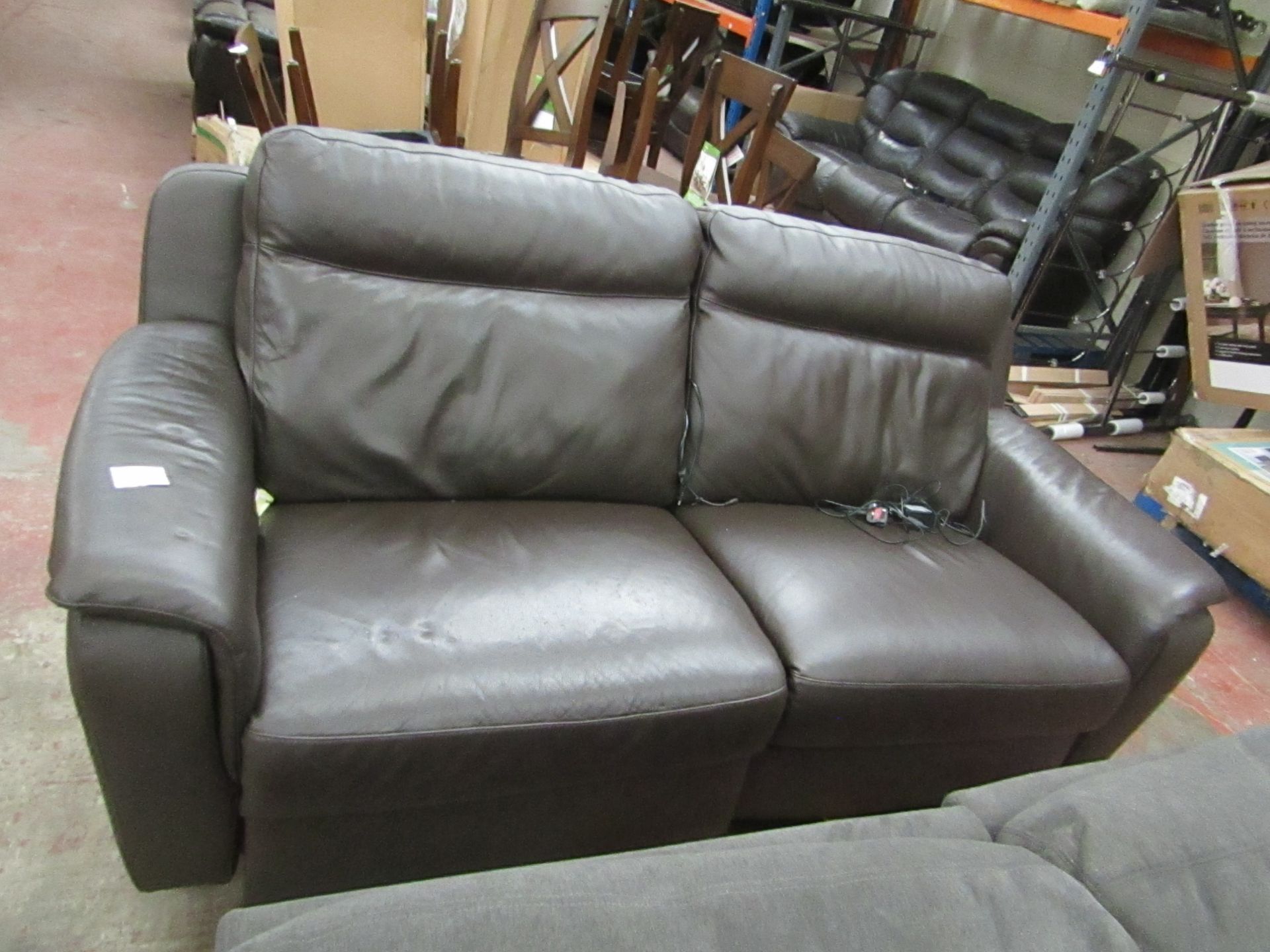 Calia 2 seater electric reclining sofa, pne side works and the other the wire has been cut.