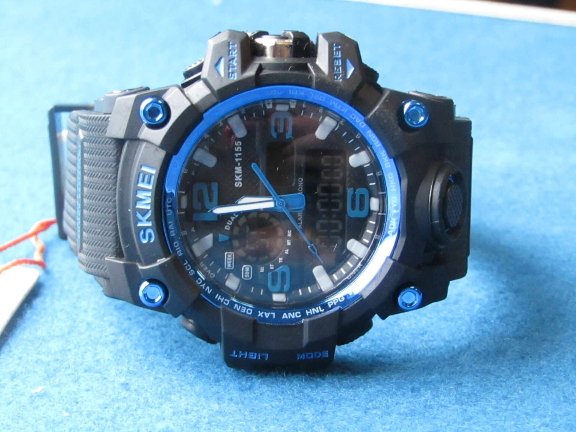 Coly Skmei Mens Analogue Digital Mulitfunctional Black / Blue Watch. Some may require battery as