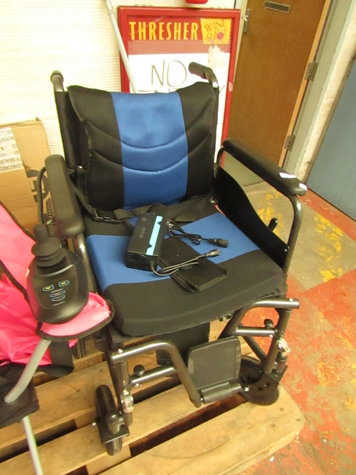 Xin Kui Kang Dual Use Folding Wheelchair.New with all accessories & Charger.The Battery casing has