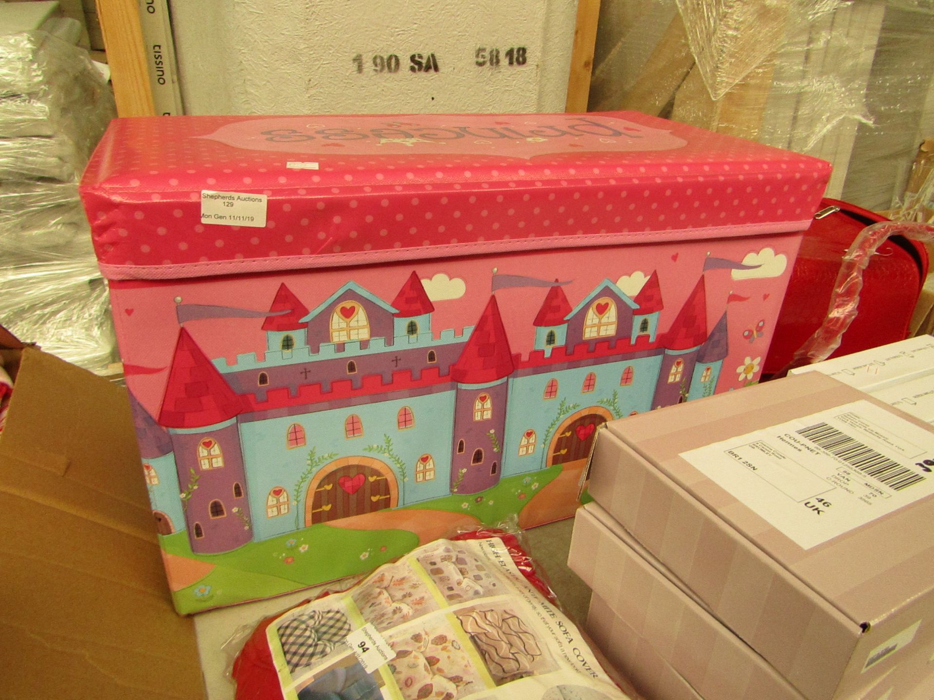 Princess storage box with cushioned Top.