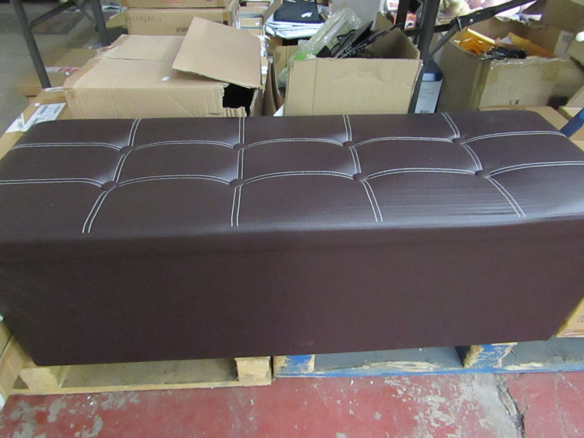 Large Brown Ottoman With Cushioned Top.108cm x 38cm x 37cm tall.Unused