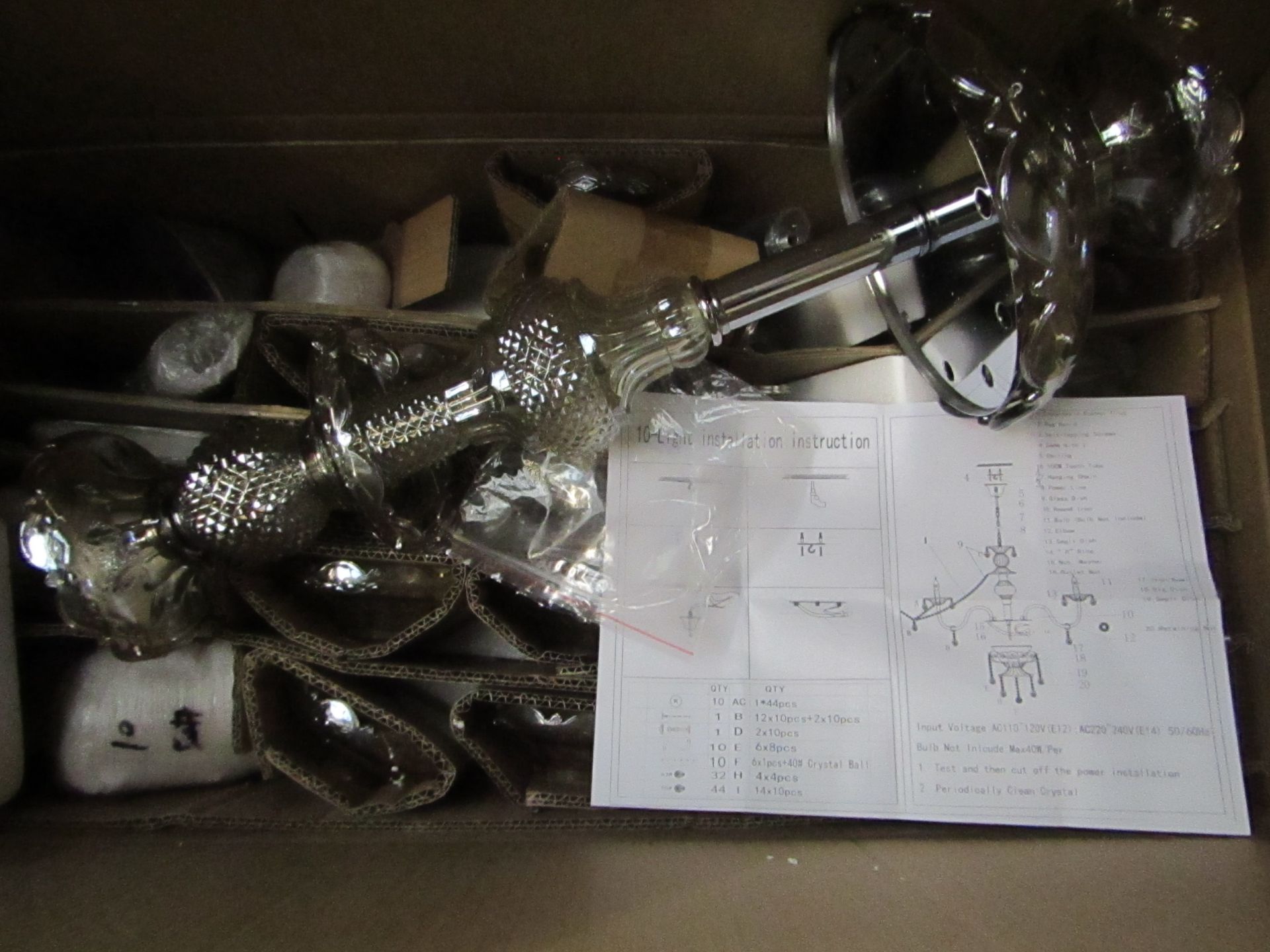 Large Glass Chandelier.Boxed &Looks complete