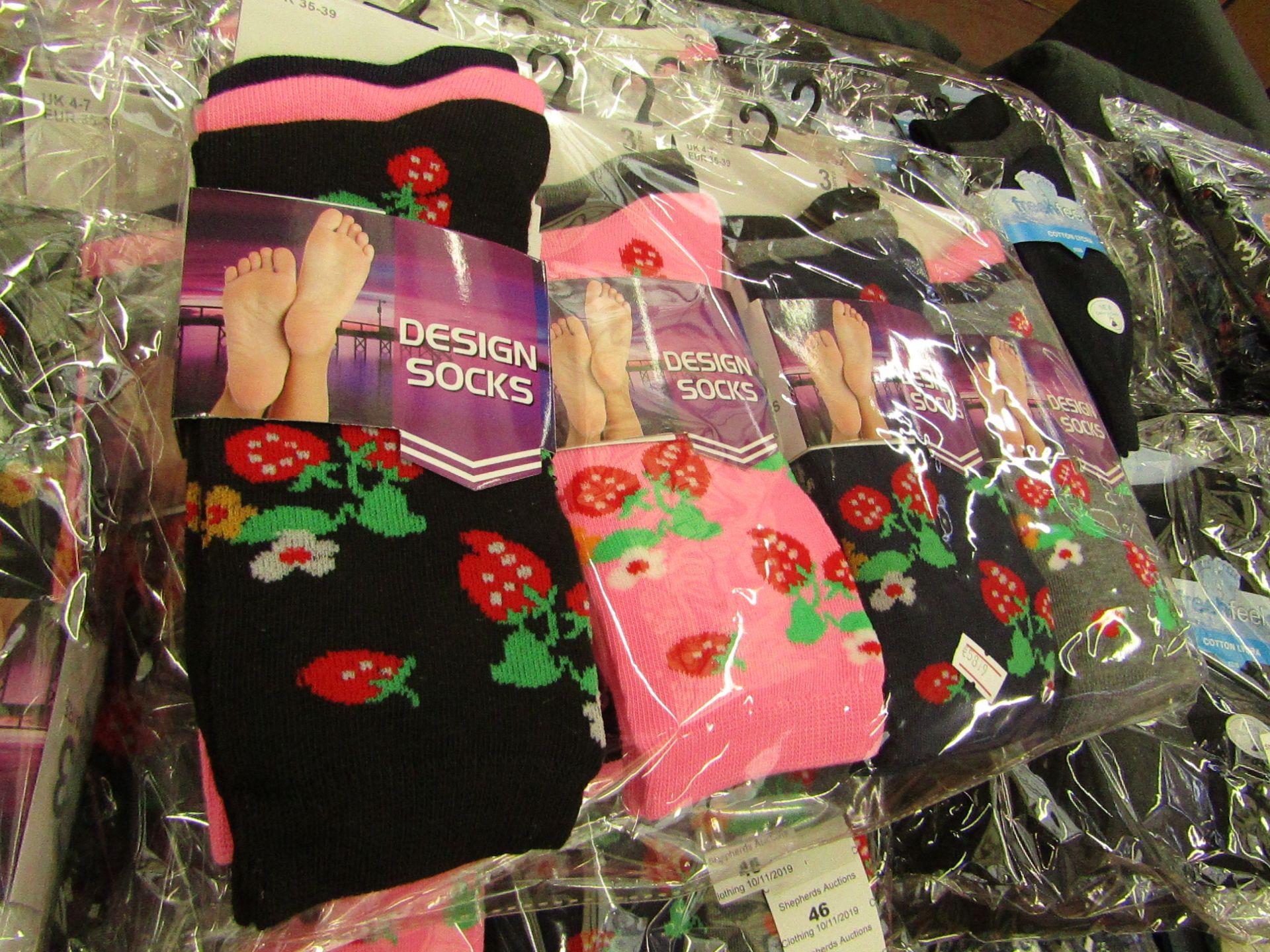 Pack of 12 x pairs Ladies Design Socks size 4-7 all new in packaging see image for design