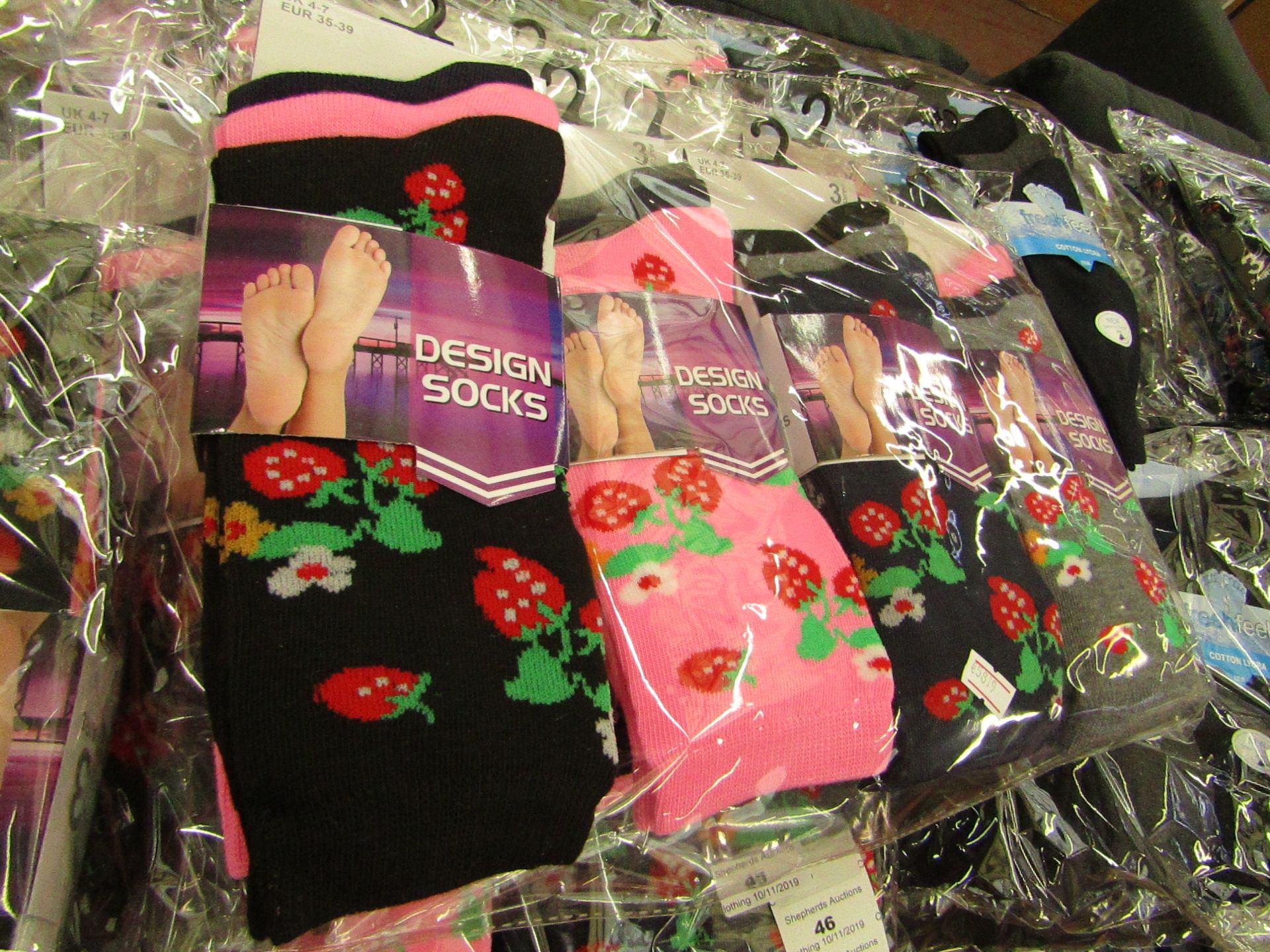 Pack of 12 x pairs Ladies Design Socks size 4-7 all new in packaging see image for design