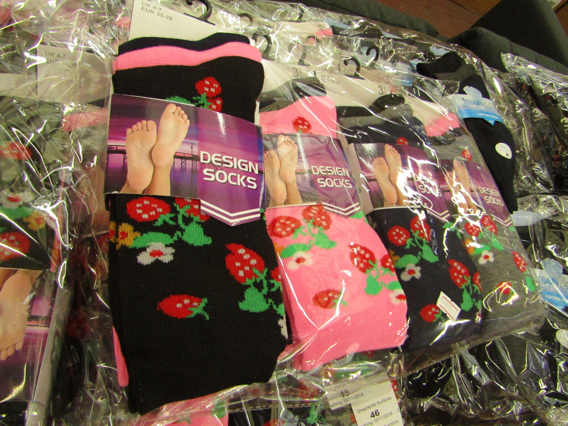 Pack of 12 x pairs Ladies Design Socks size 4-7 all new in packaging see image for design