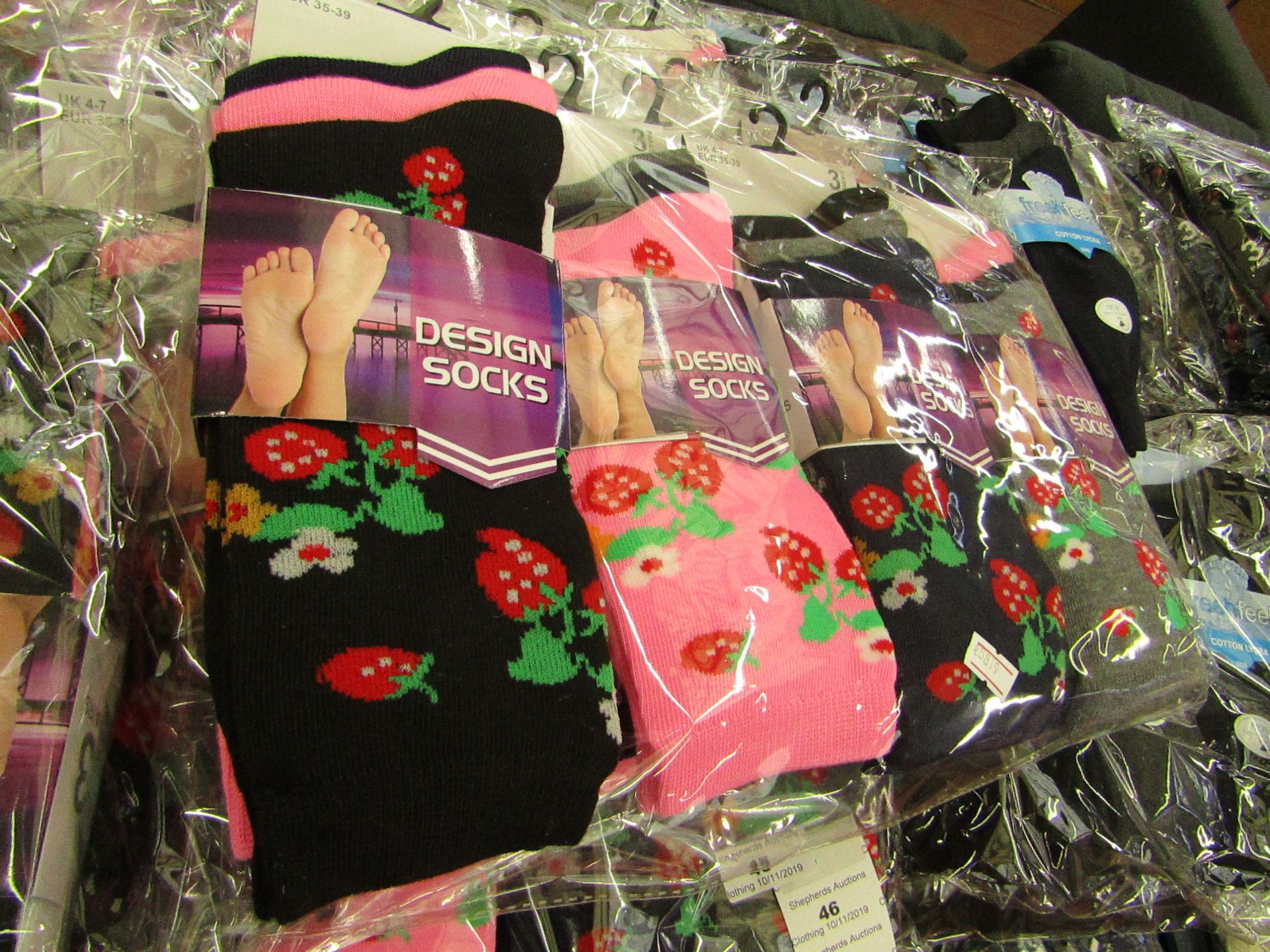 Pack of 12 x pairs Ladies Design Socks size 4-7 all new in packaging see image for design