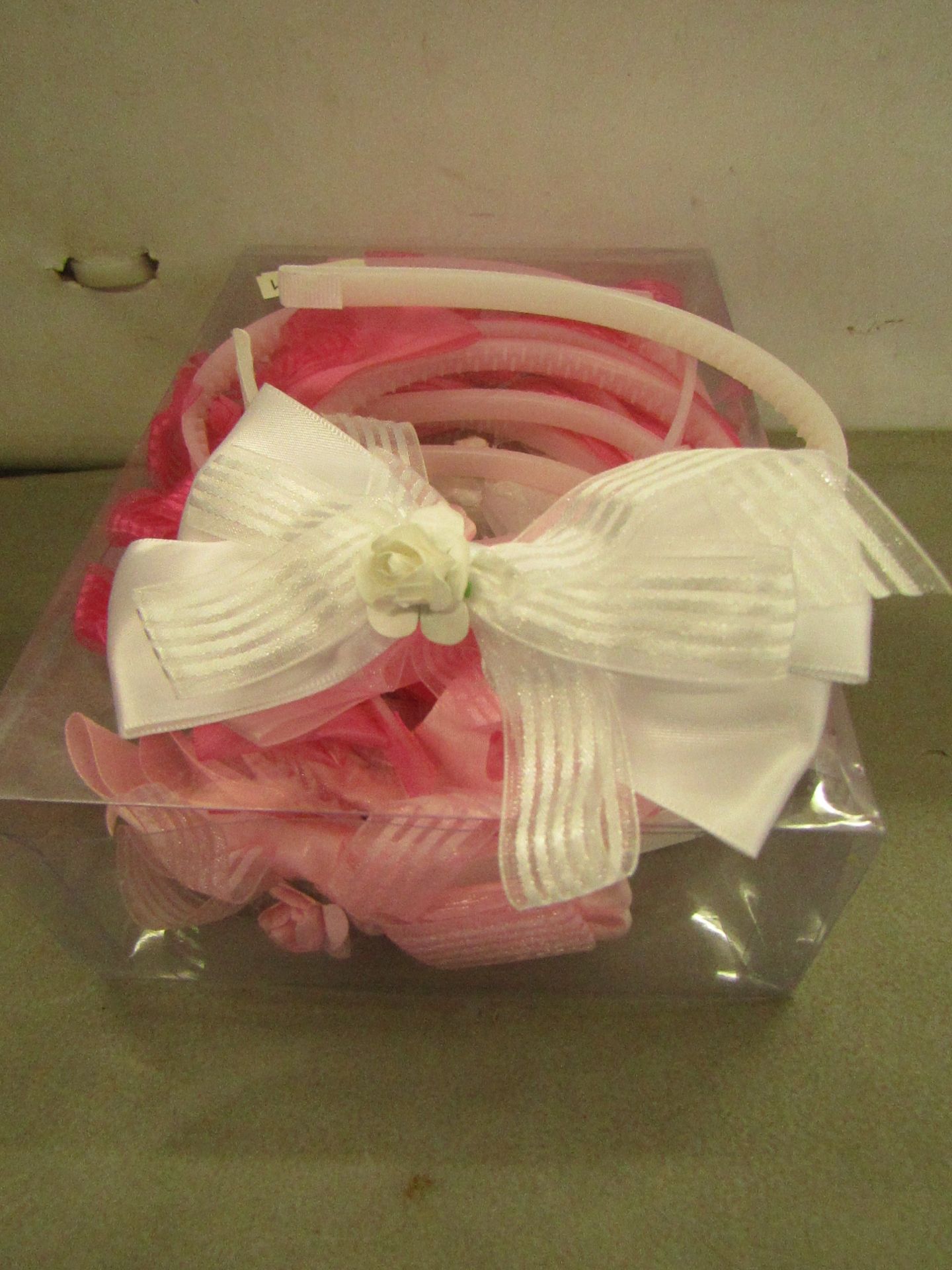 12 x various Coloured Diamante & Bow Headbands similar product is RRP £3.50 each @ Claires