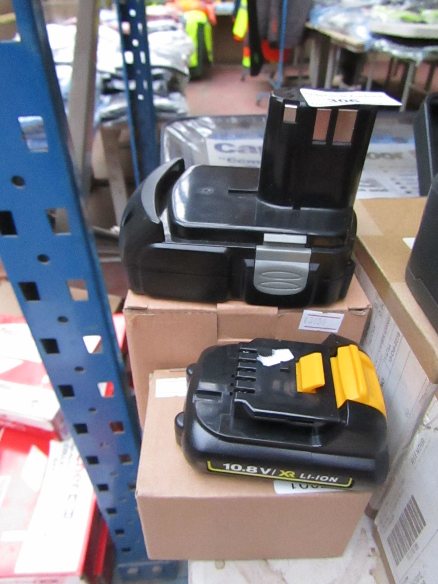 2x Power tool batteries, both boxed