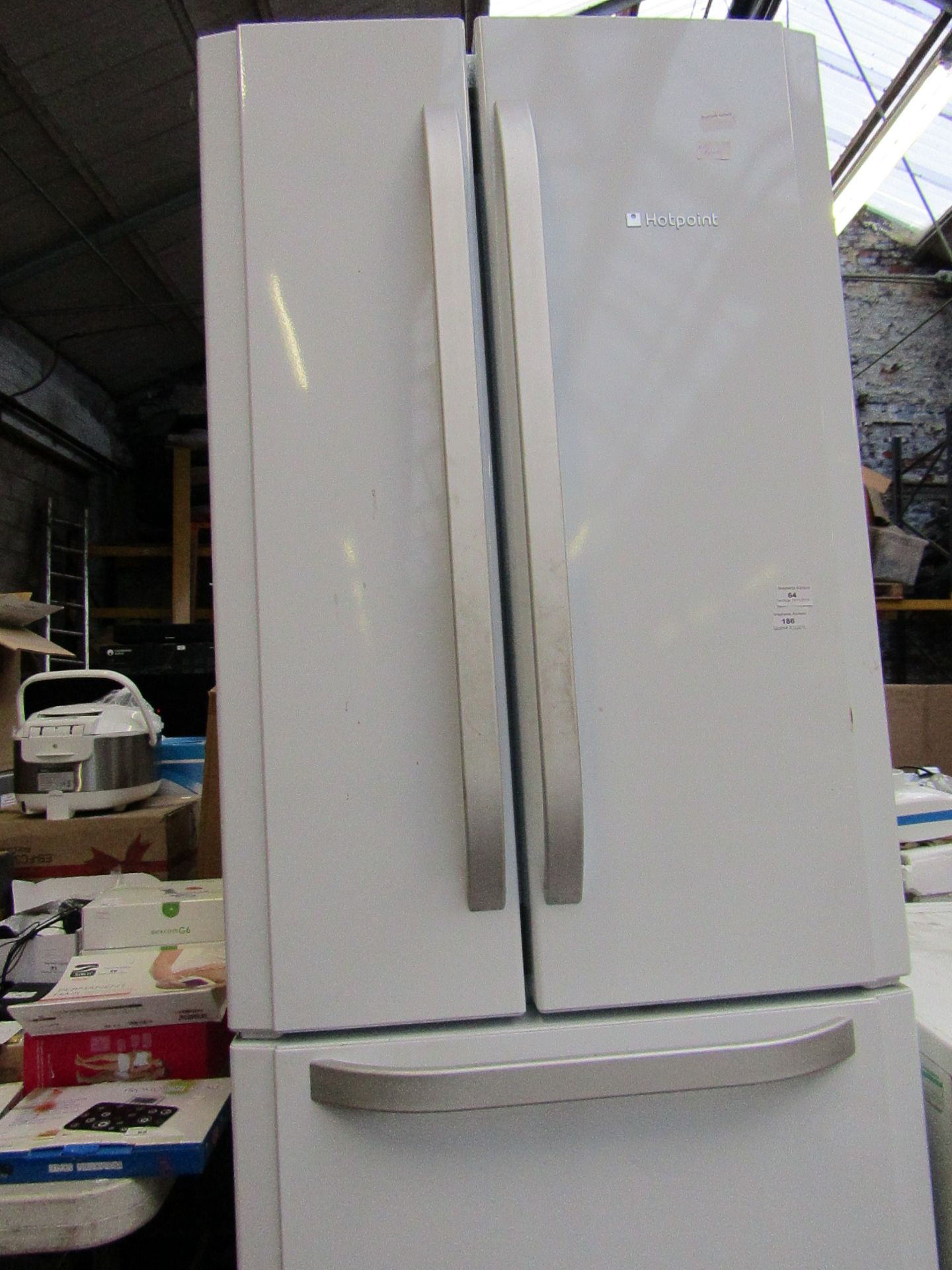 Hotpoint tall freestanding fridge freezer, no power.