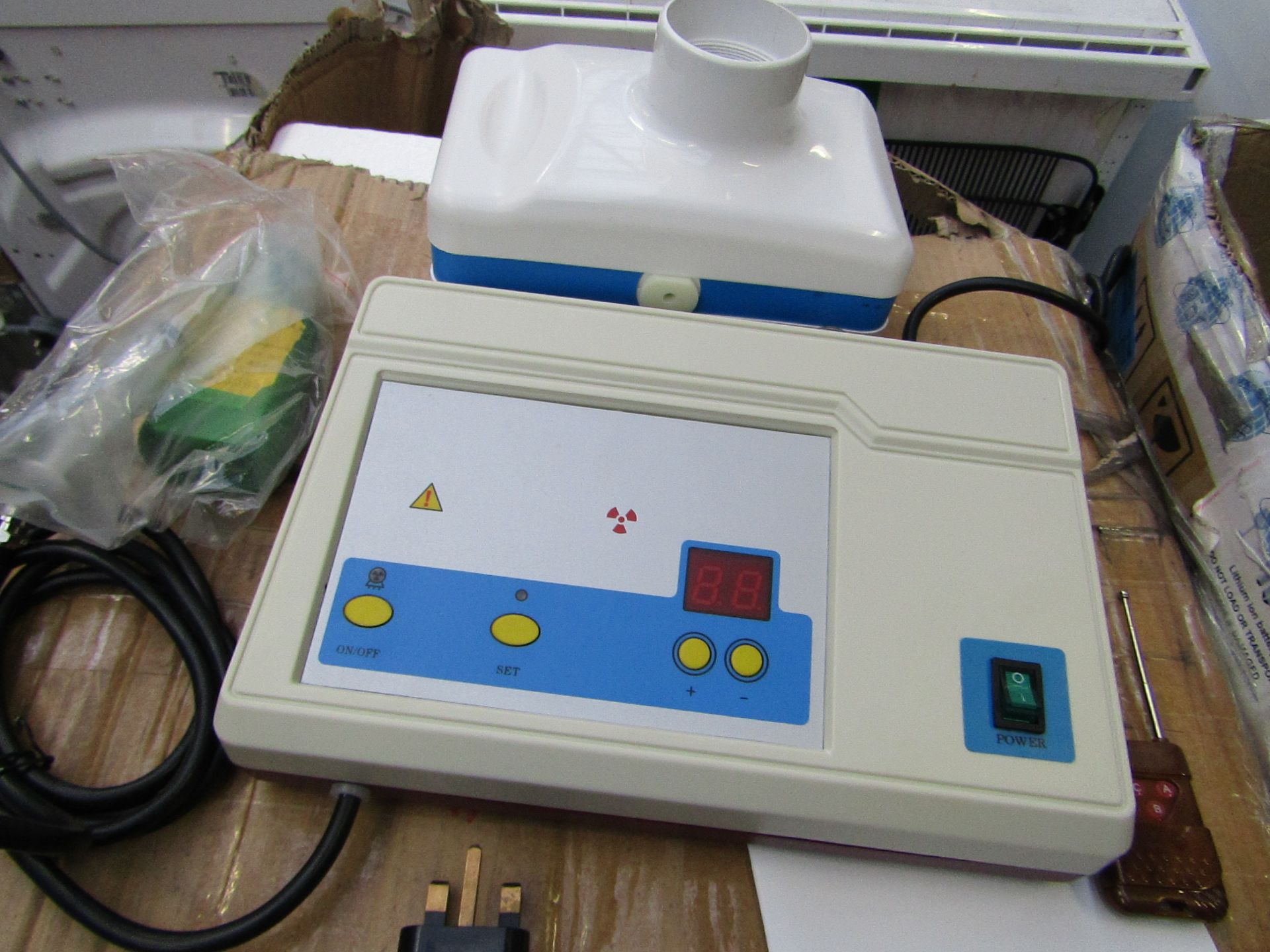 Portable Dental X-ray machine, accessories included, untested and boxed.