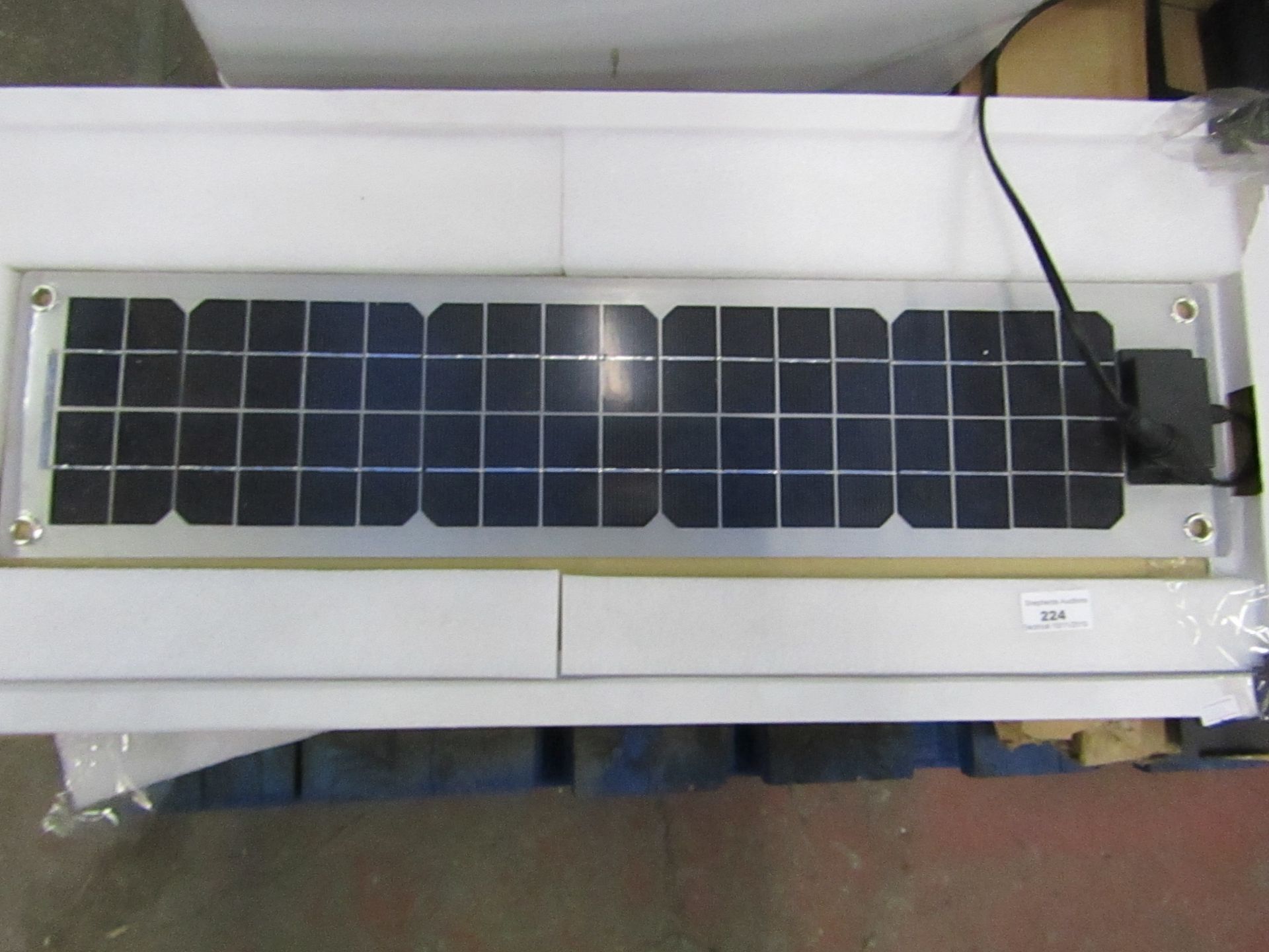 Semi flexible solar panel, untested and boxed.