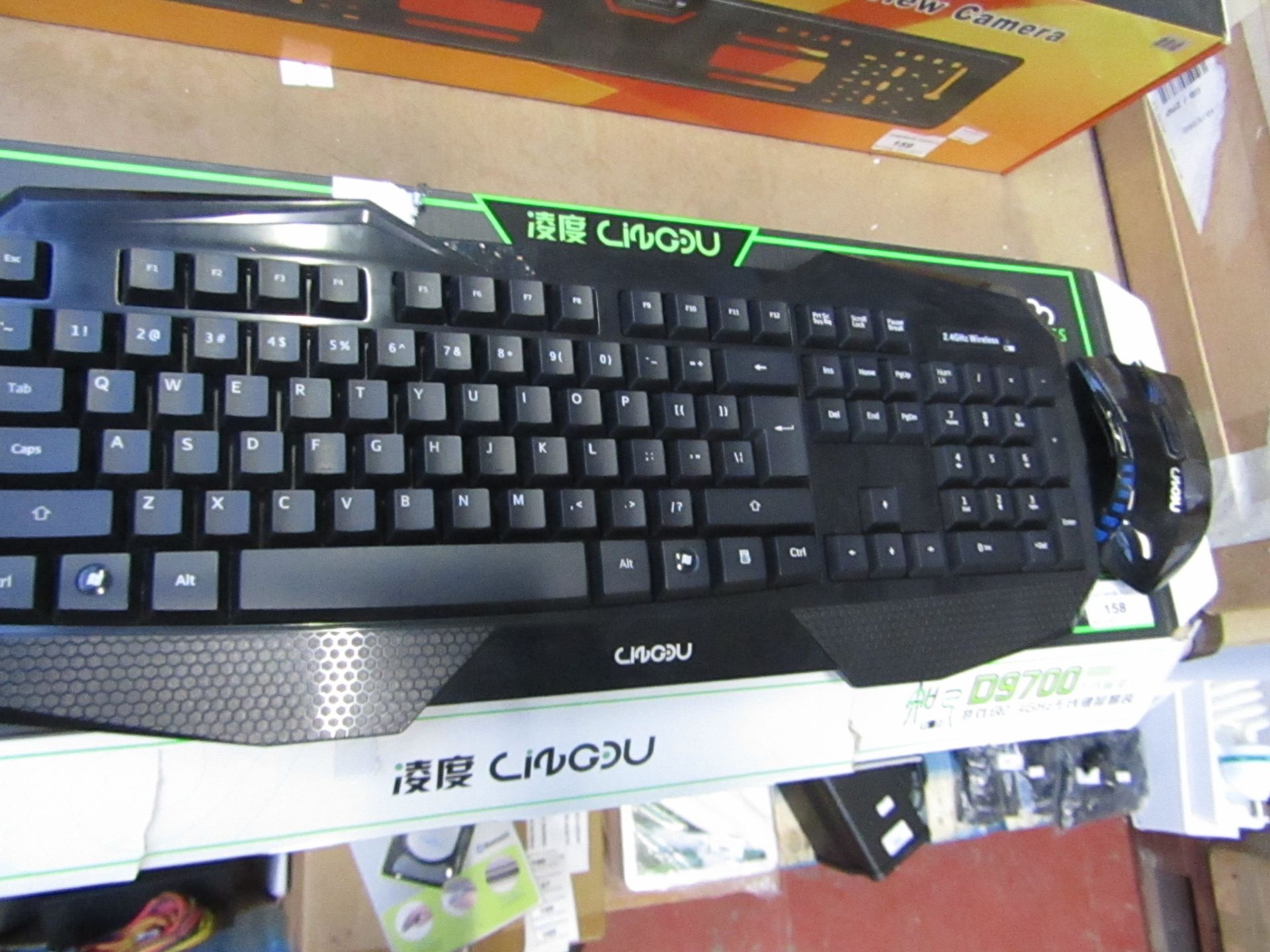 D9700 wireless gaming keyboard and mouse, tested working and boxed.