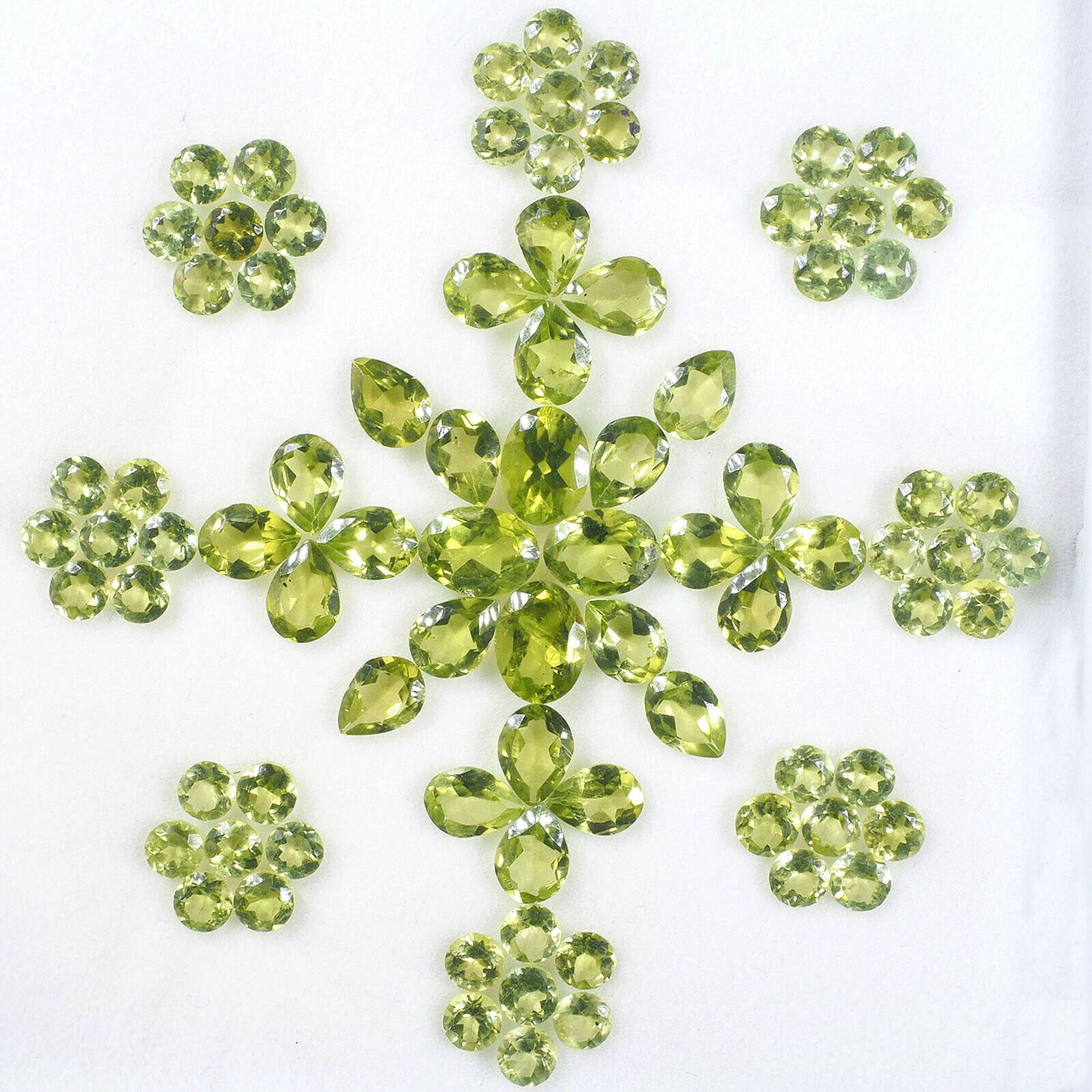 Natural Peridot 37.65 carat 84 pieces - WOW! A Truly amazing Shimmering Green Round Diamond &