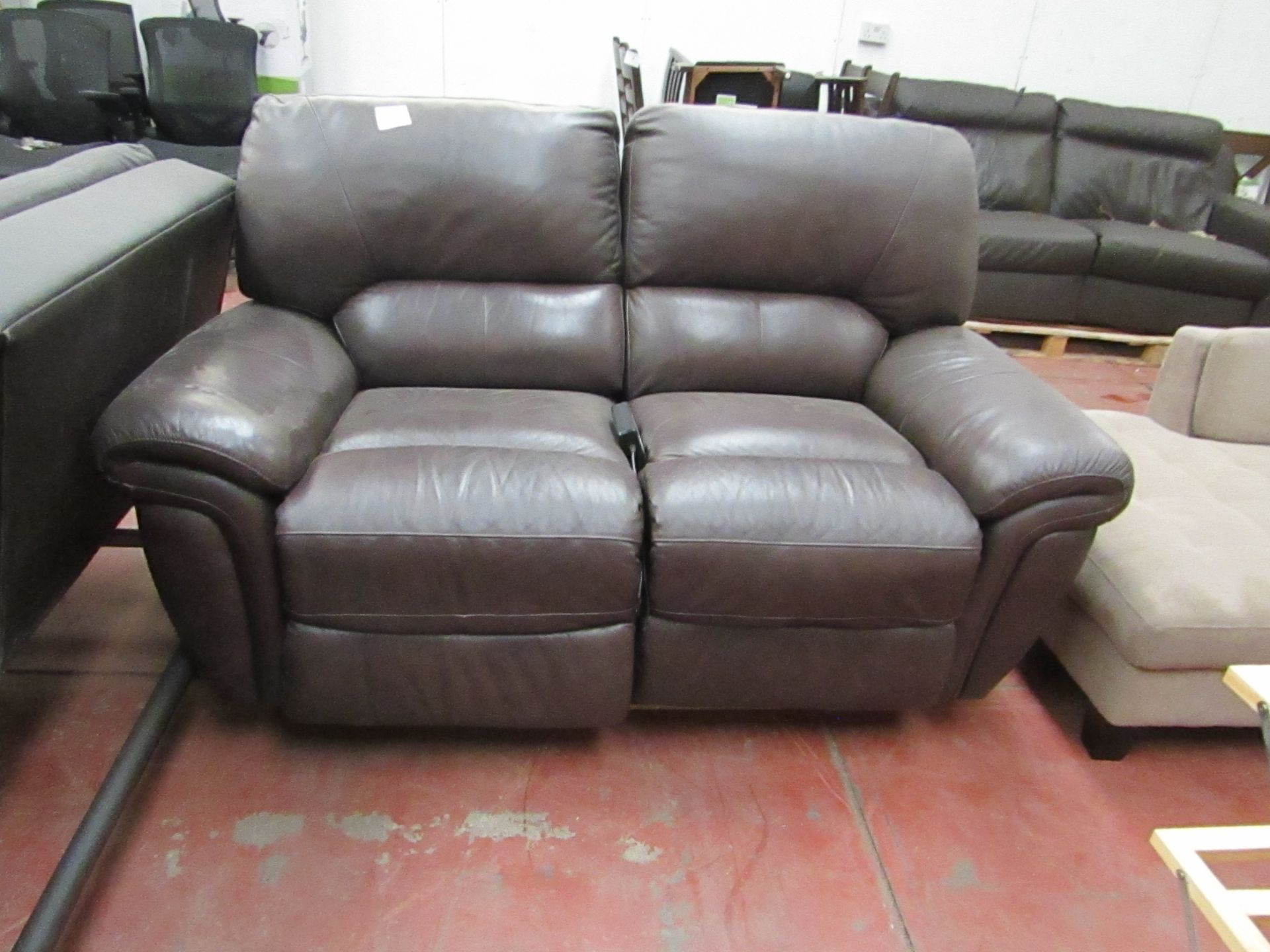 La Z Boy Electric Brown leather reclining sofa, tested working but has damage to the seat